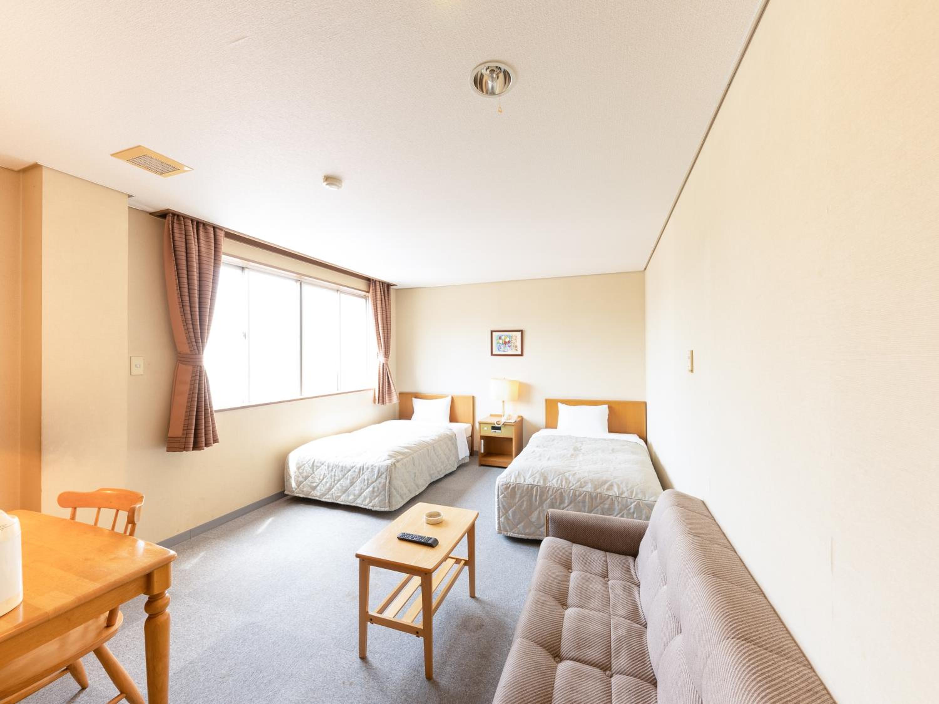 Standard Twin Room - Non-Smoking - Photo 8