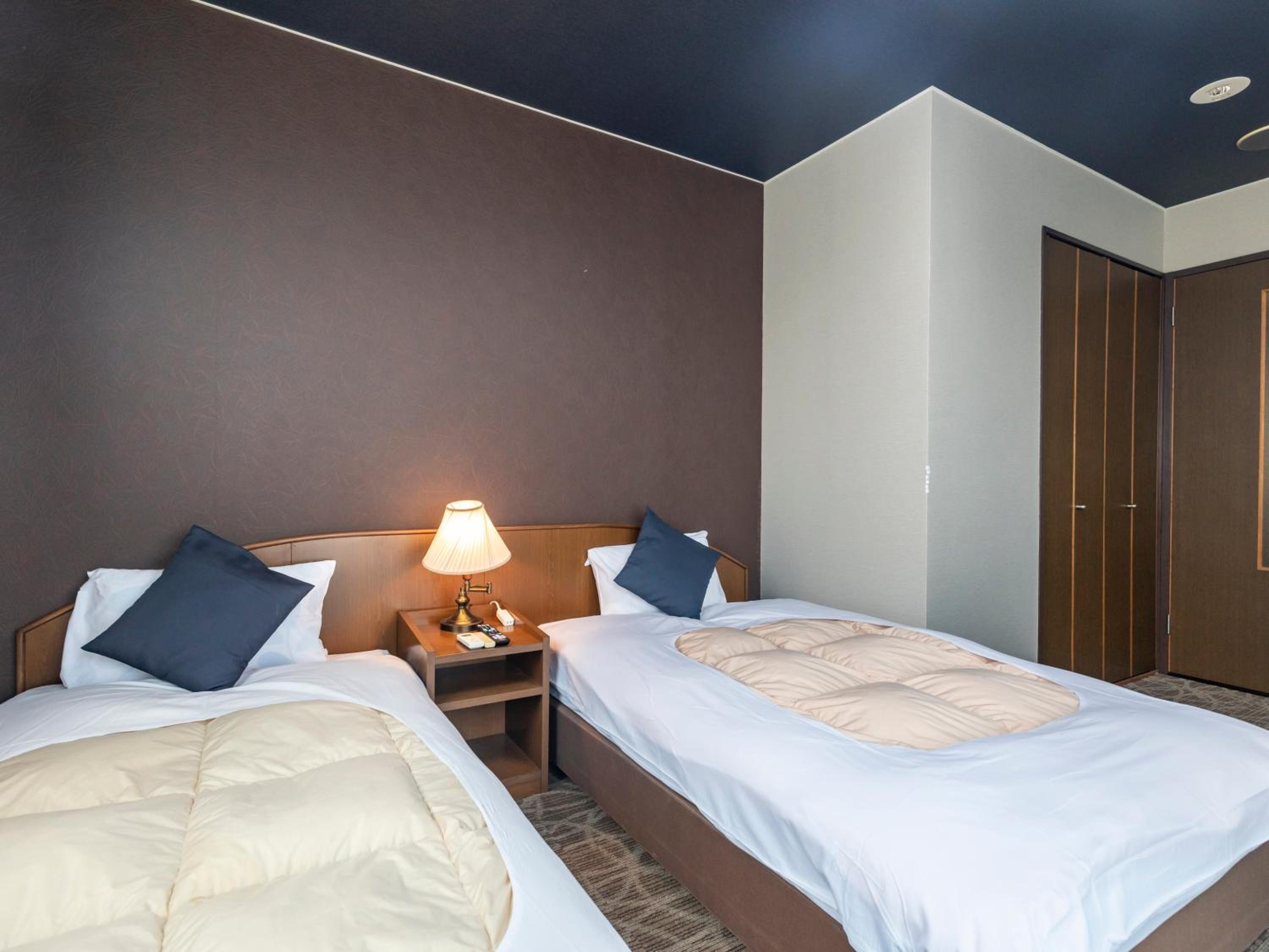 Twin Room - Photo 7