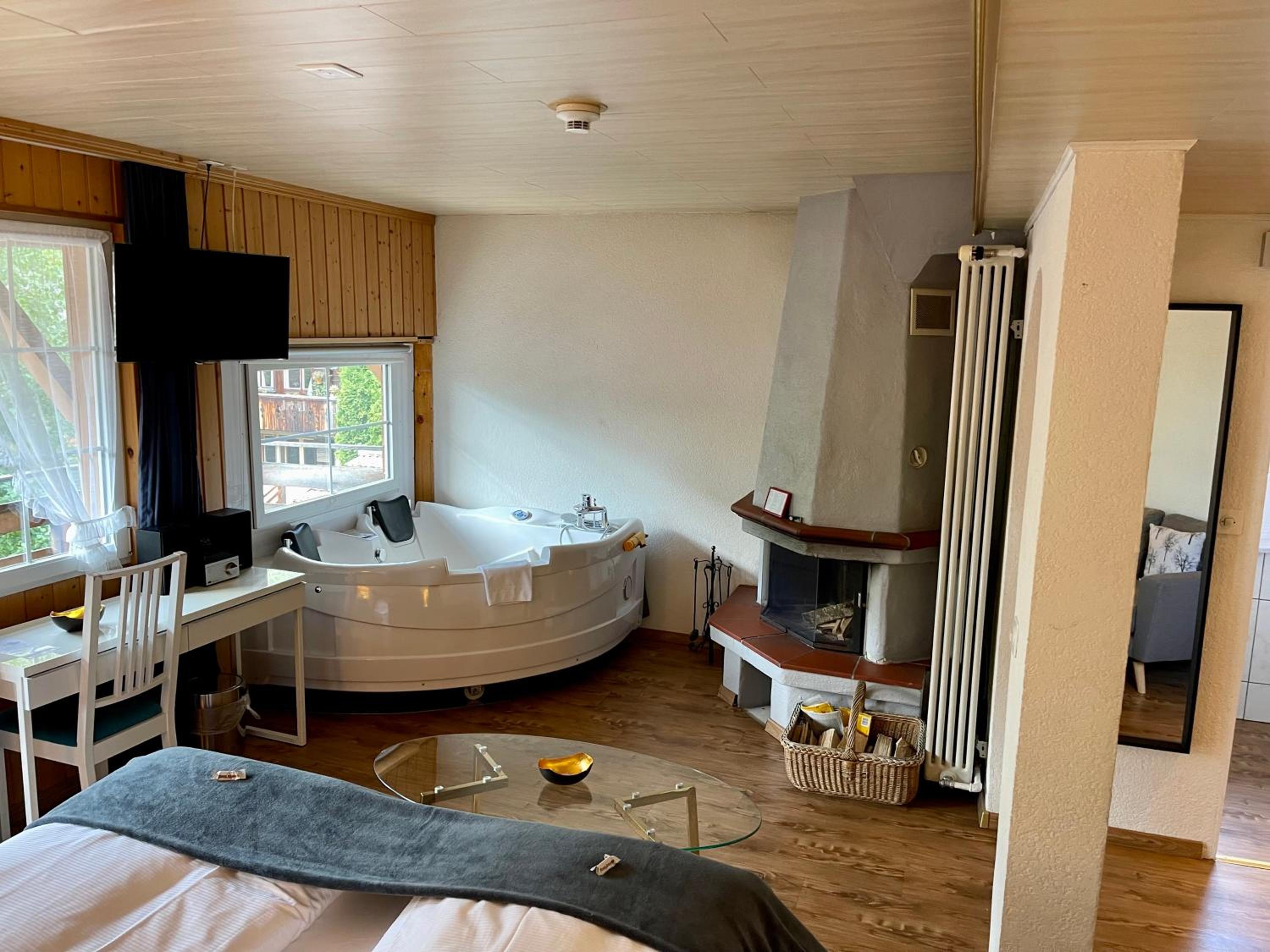 Superior Room Plus with rolling-out Whirlpool and Fireplace