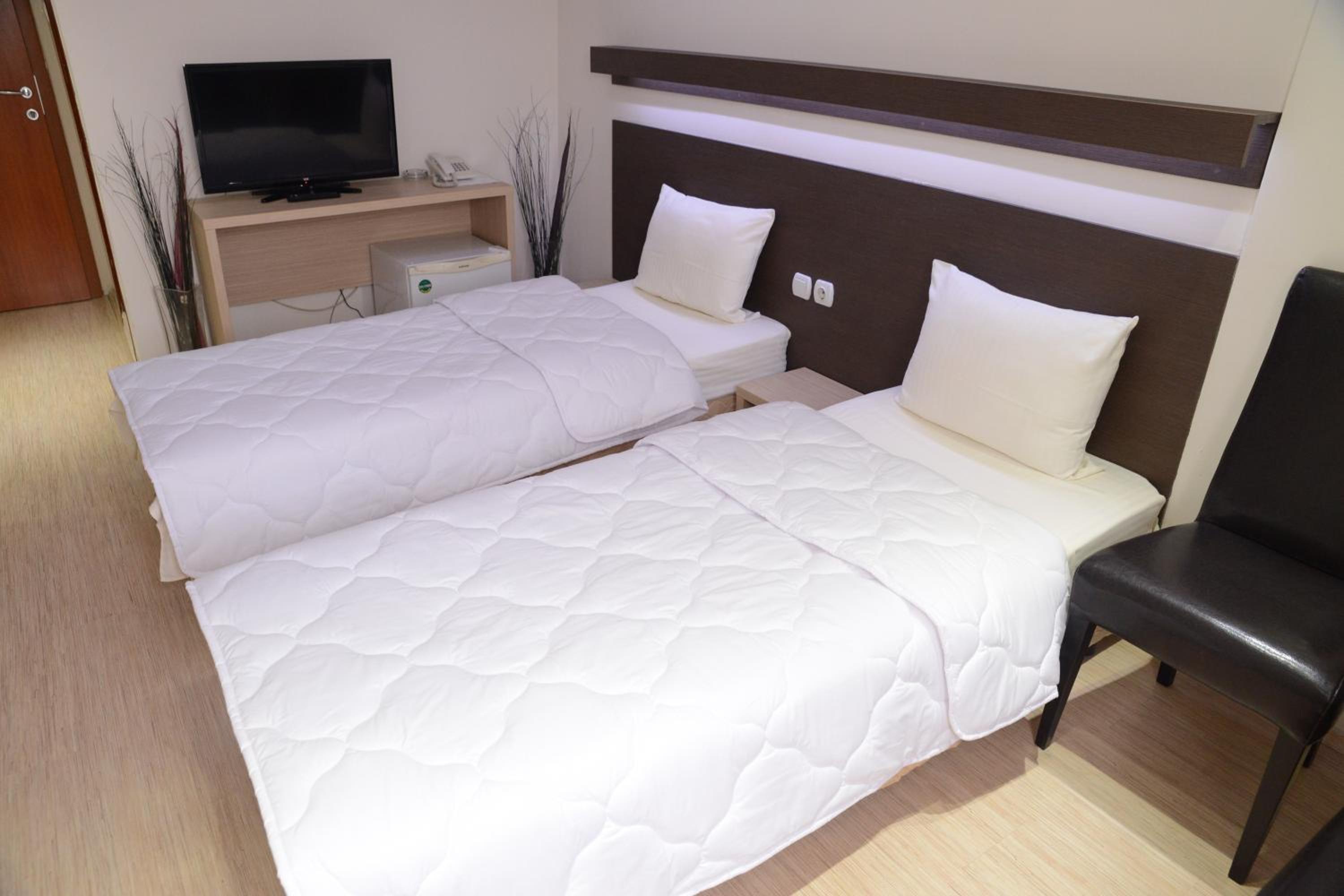 Twin Room - Photo 9