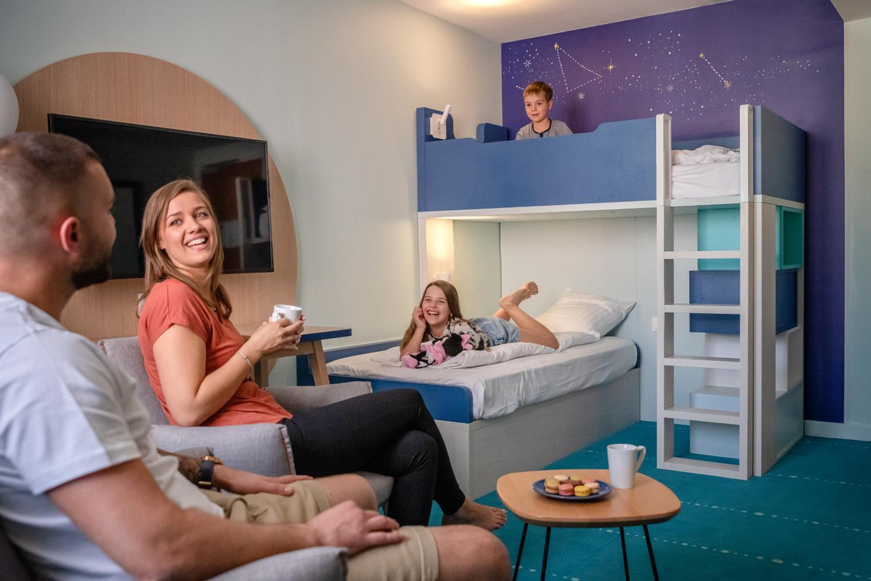Family fun in a vibrant hotel room!