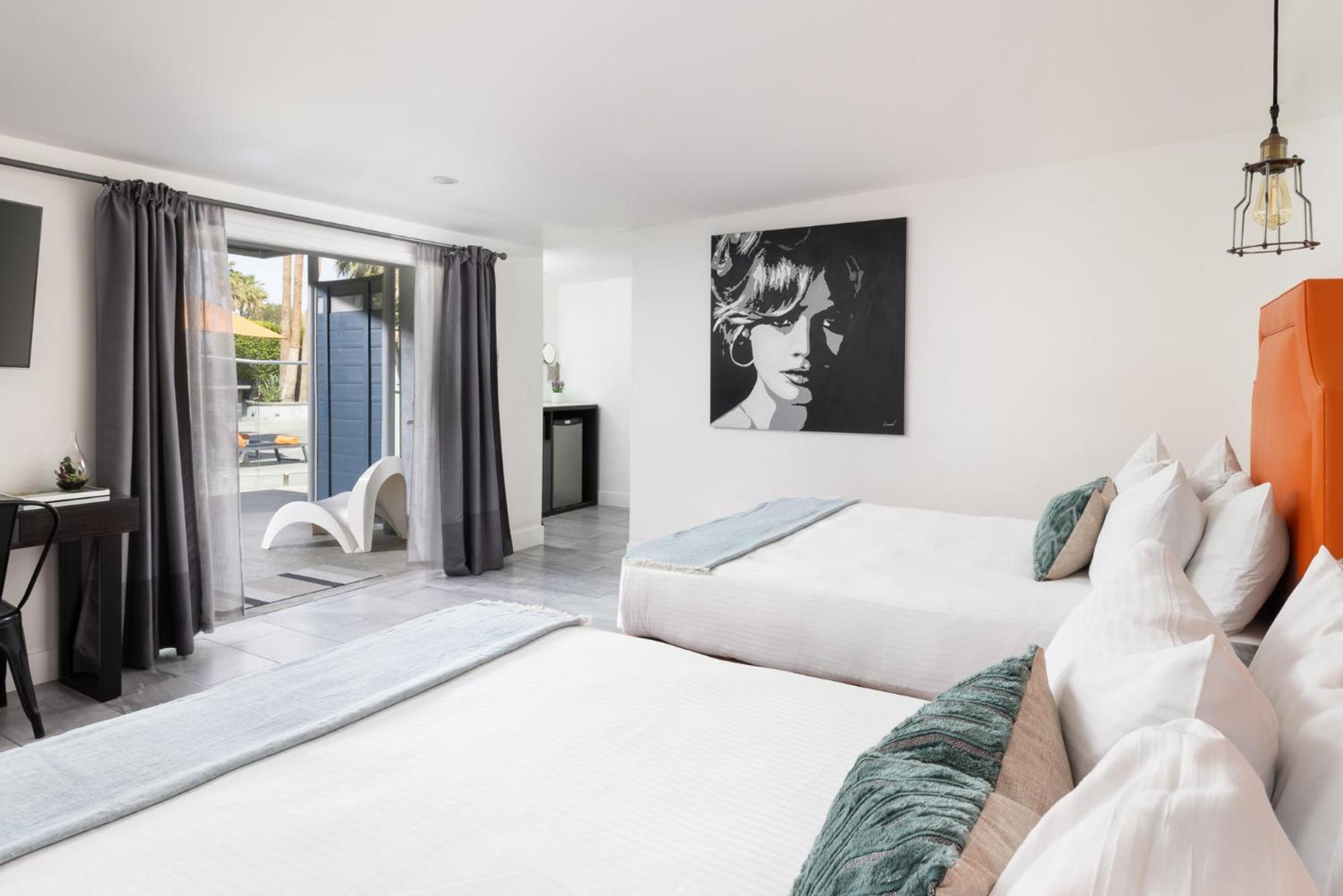 Deluxe Queen Room with Two Queen Beds - Photo 1