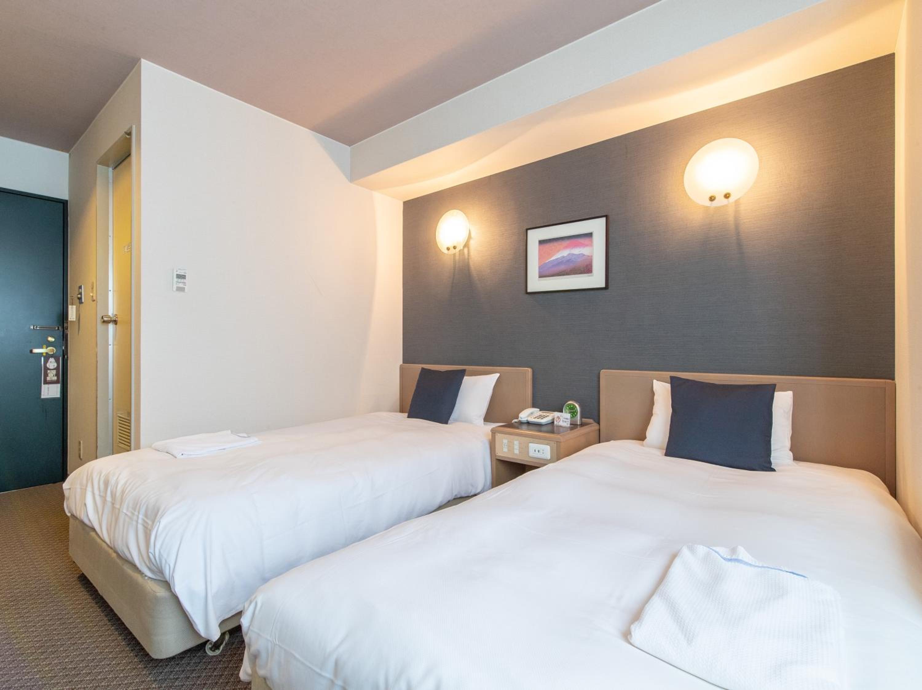 Economy Twin Room - Non-Smoking - Photo 1