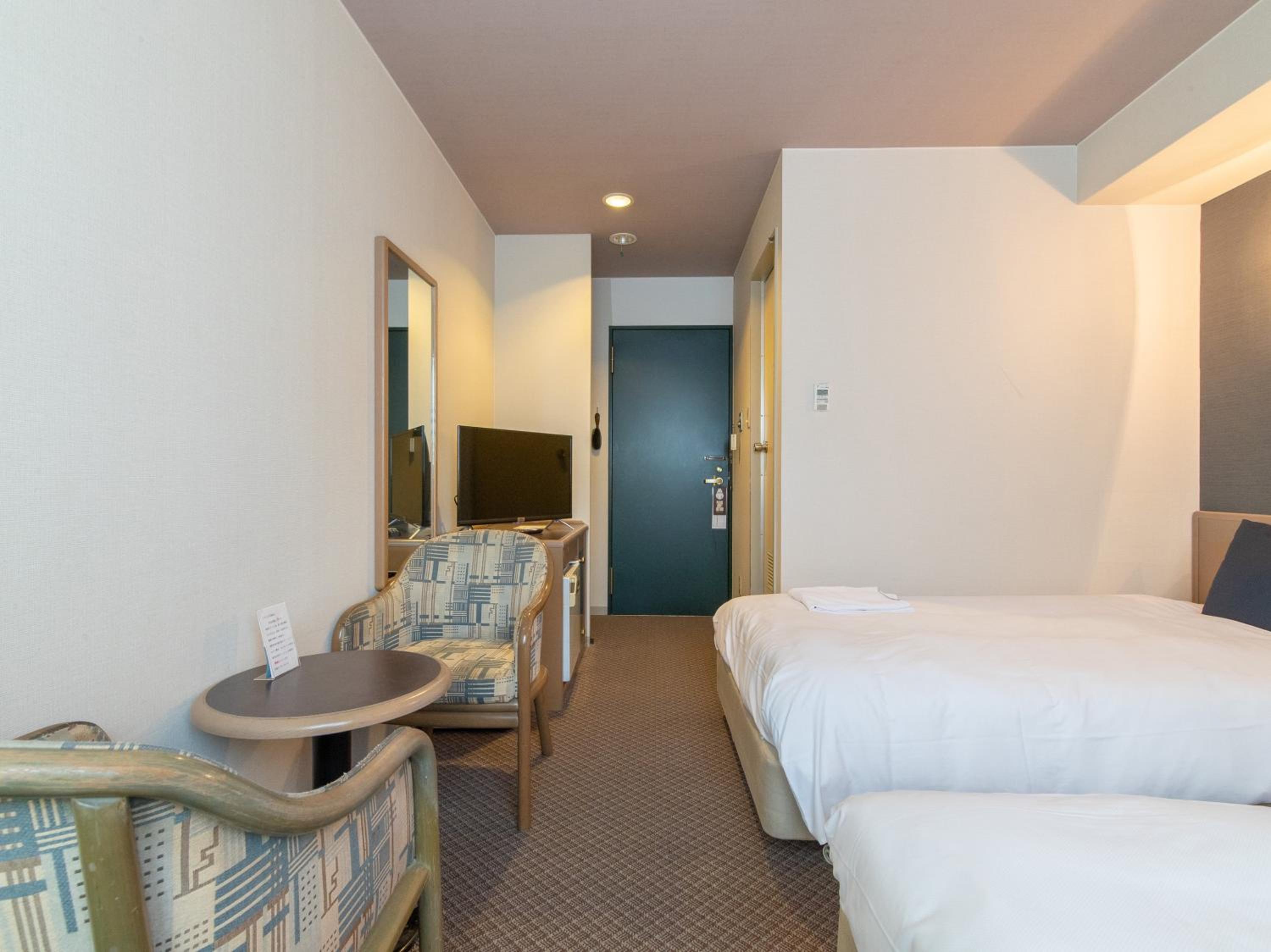 Economy Twin Room - Non-Smoking - Photo 7