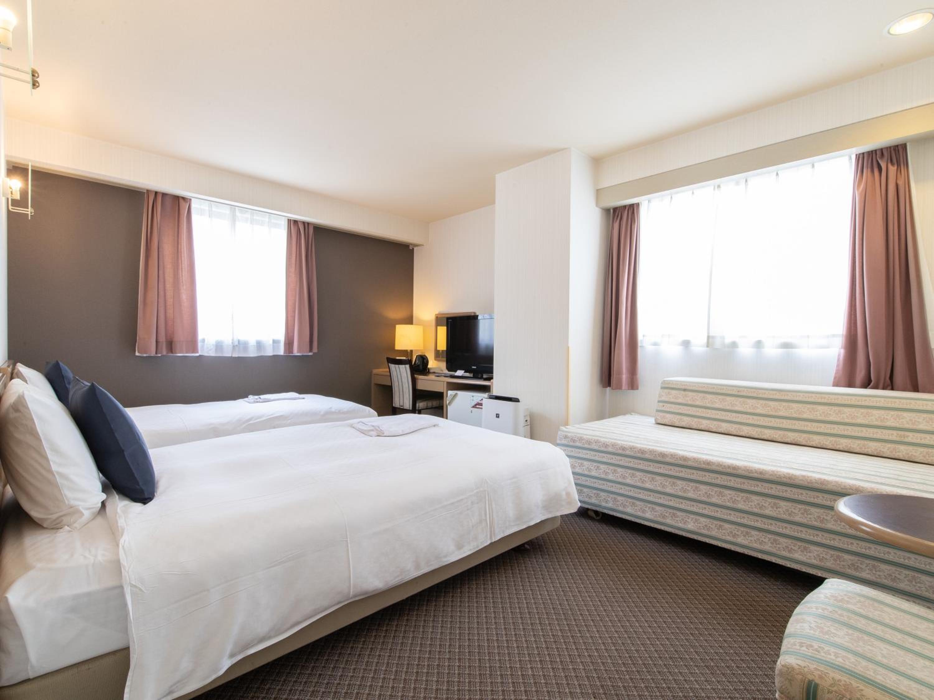 Twin Room - Non-Smoking - Photo 14