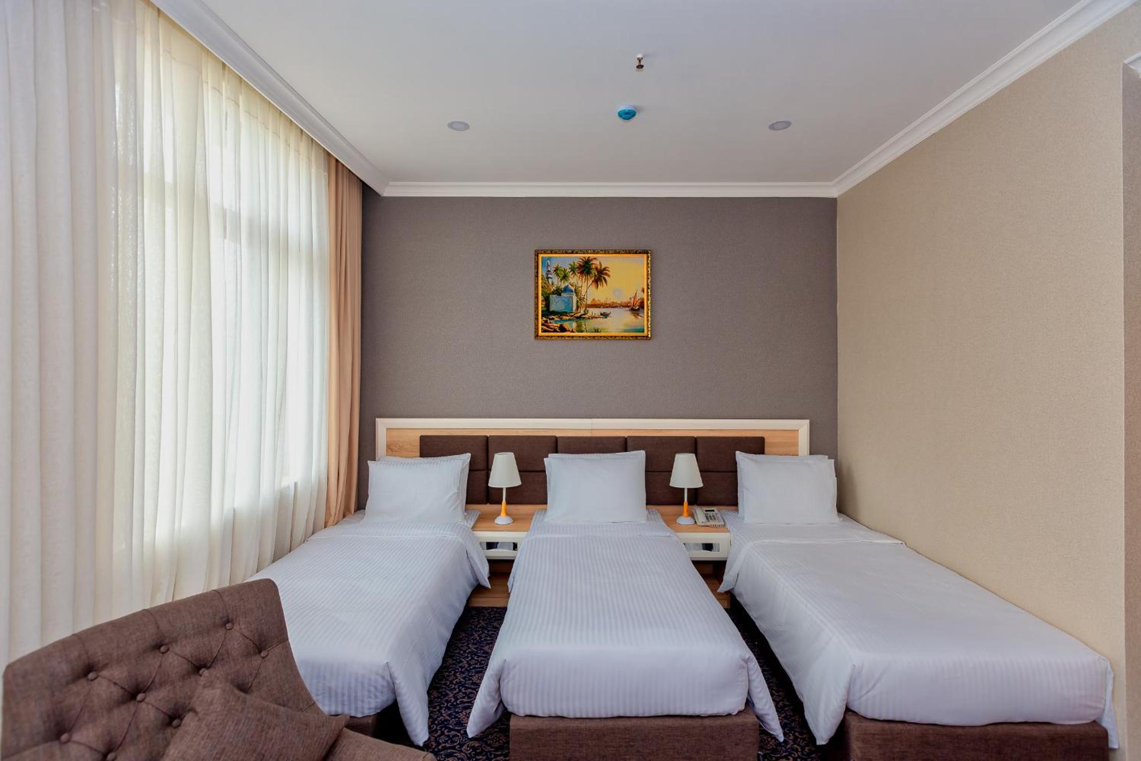 Deluxe Triple Room