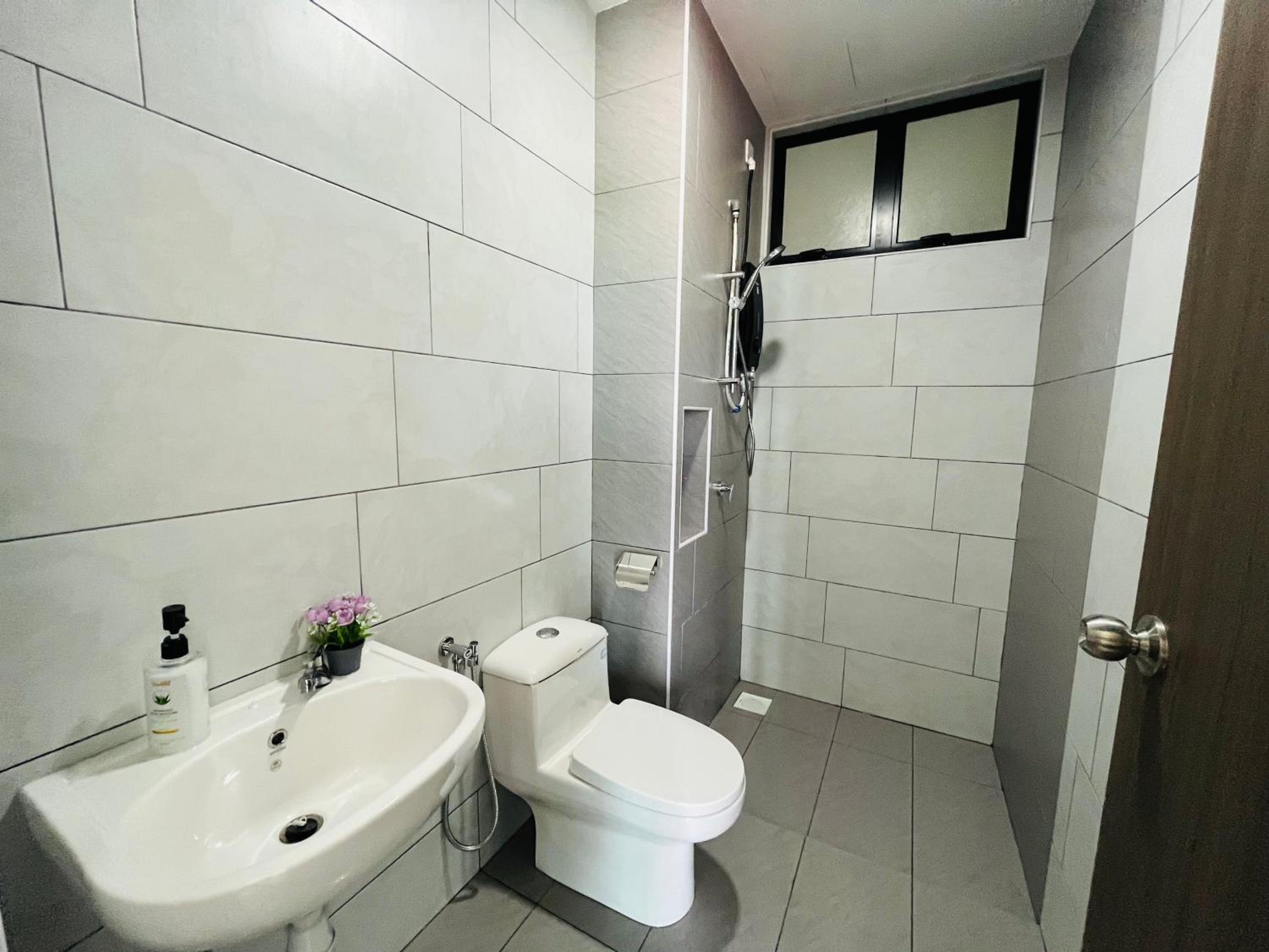 Three-Bedroom House - Photo 16