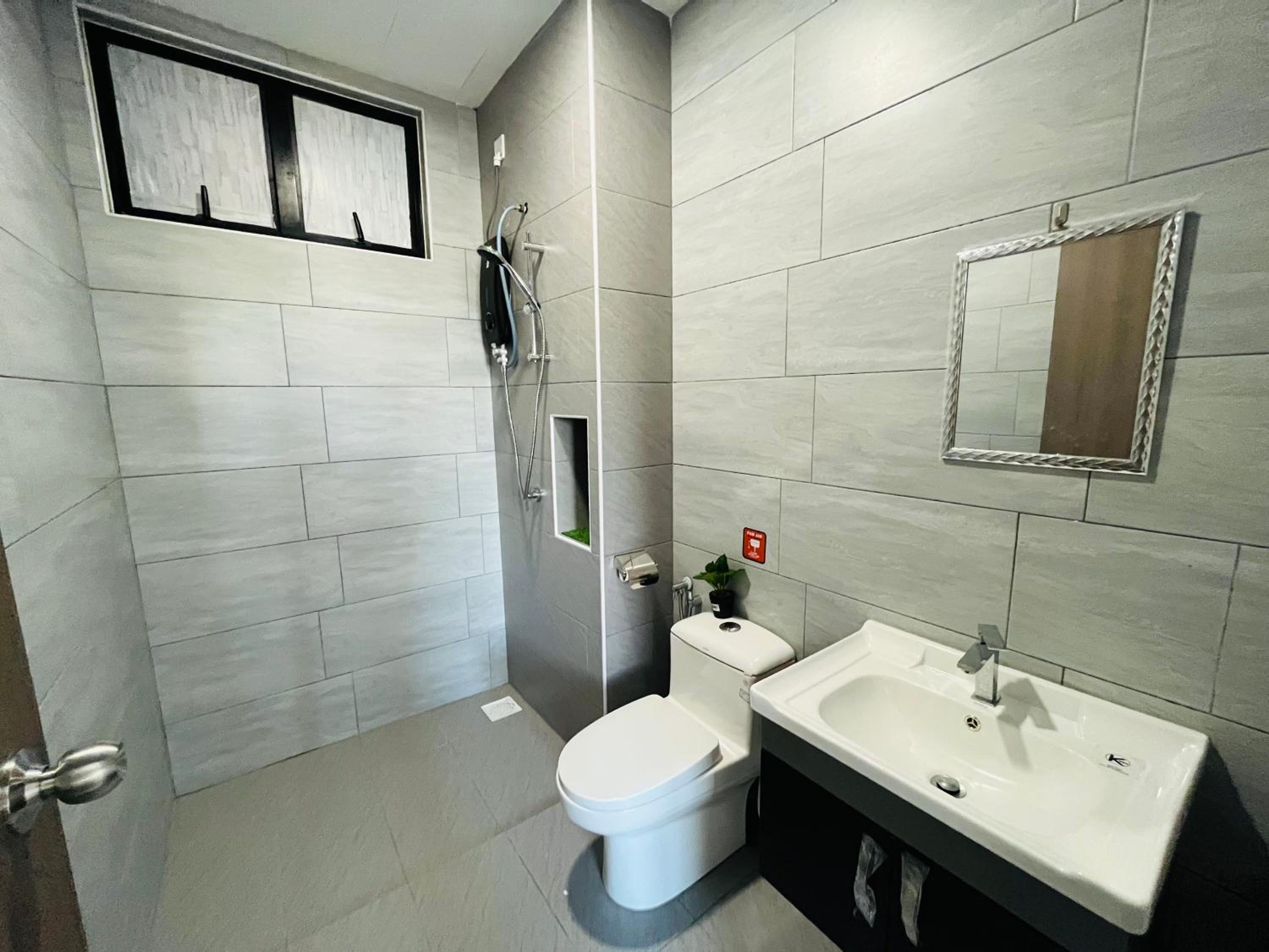 Three-Bedroom House - Photo 18