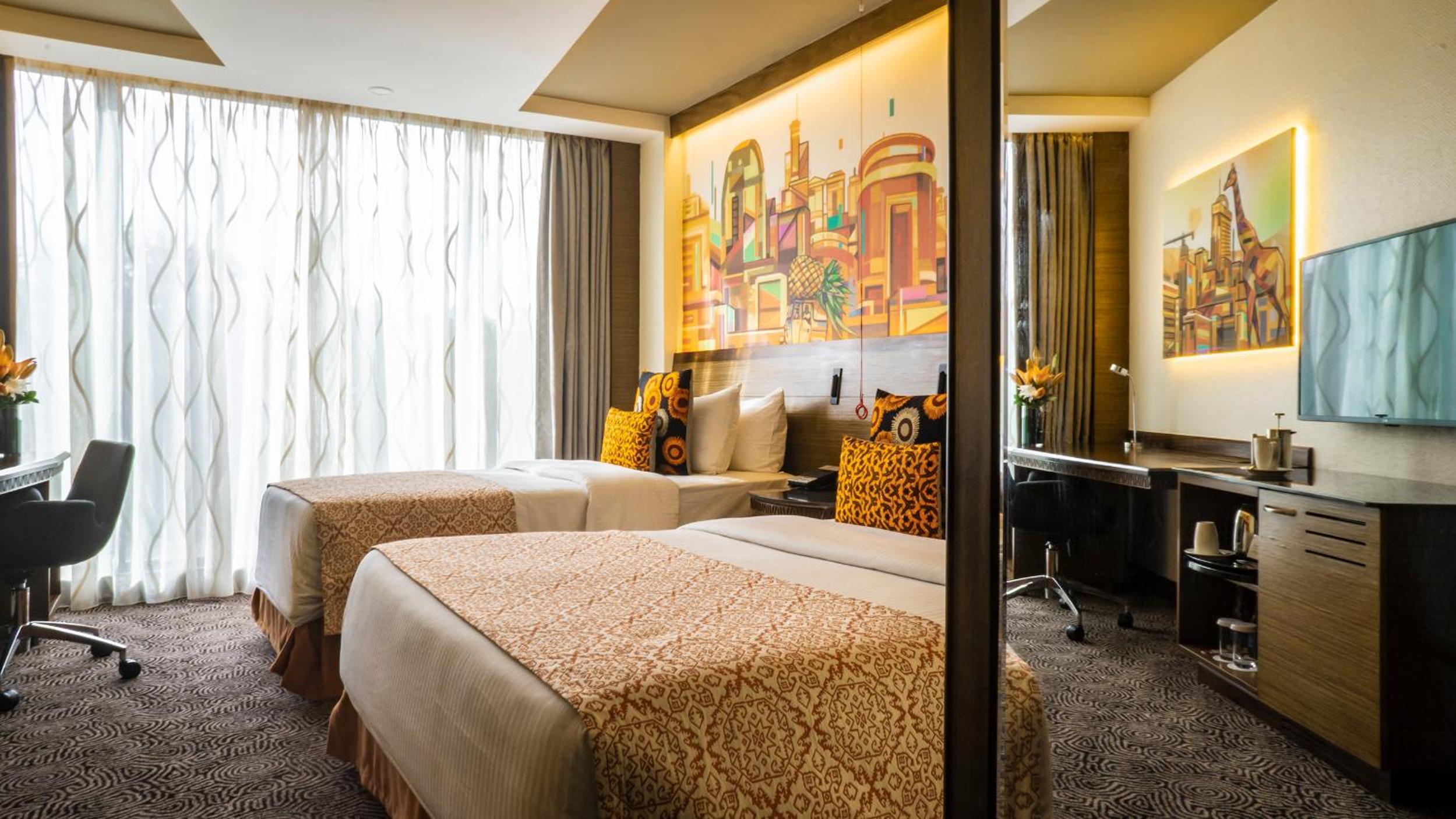 Panafric Deluxe Twin Room - Photo 1