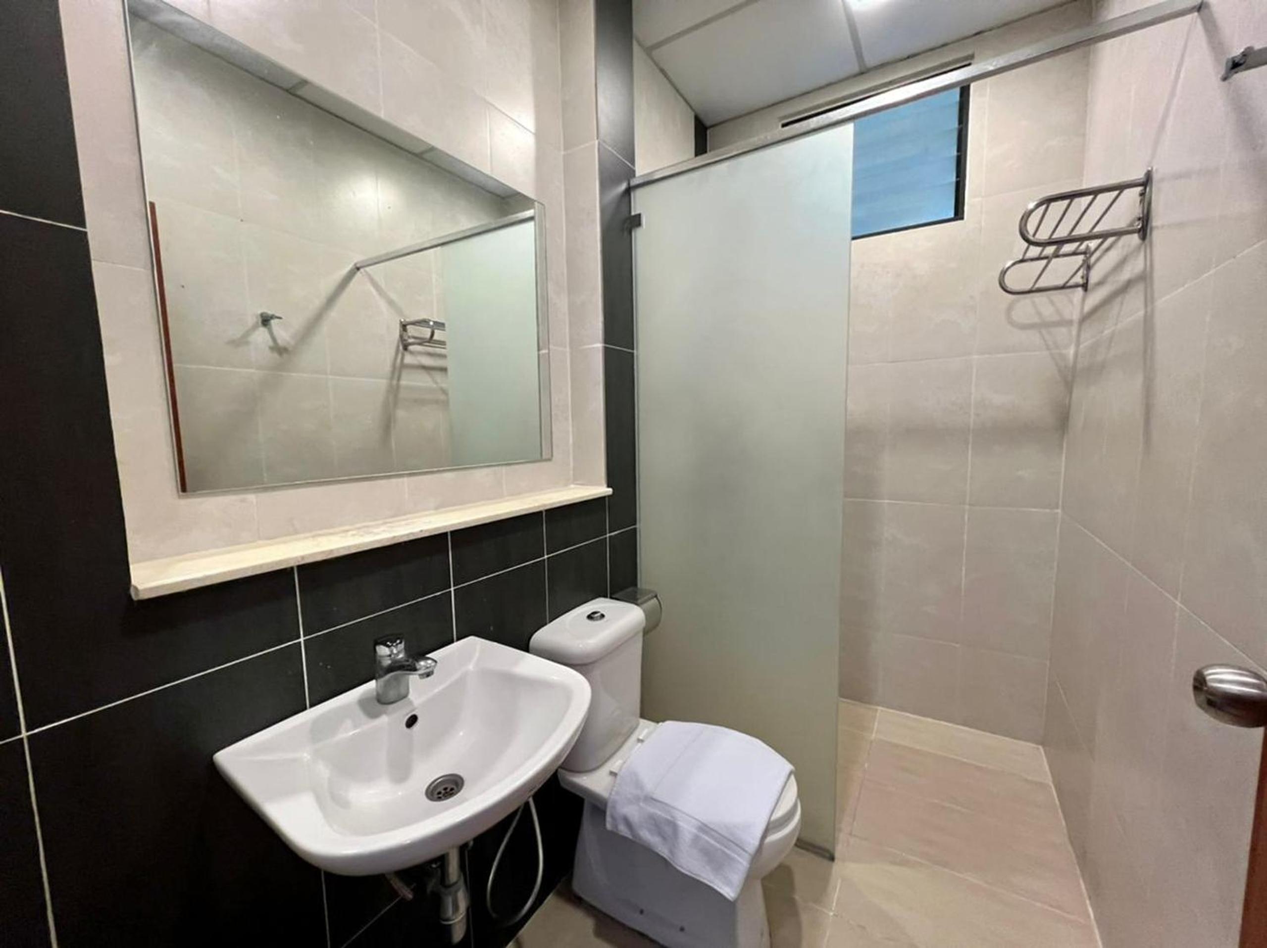 Three-Bedroom Apartment - Photo 2
