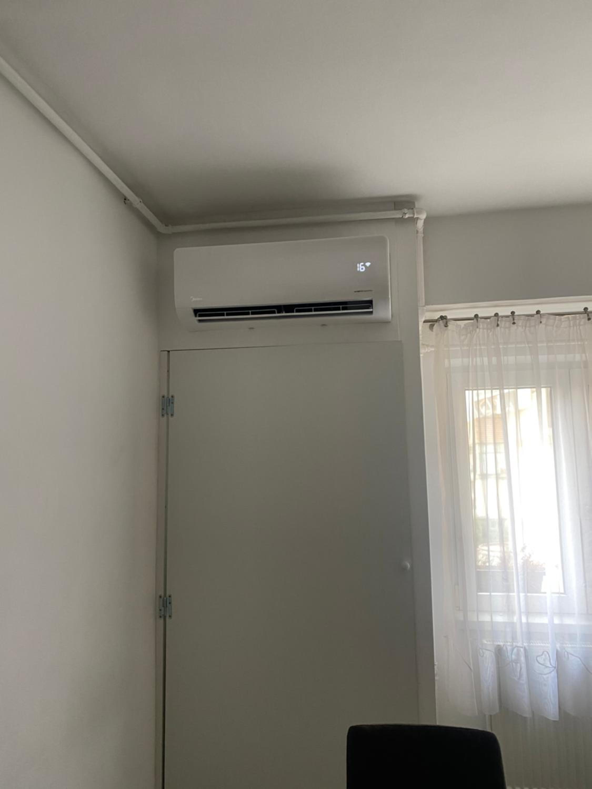 Three-Bedroom Apartment - Photo 16