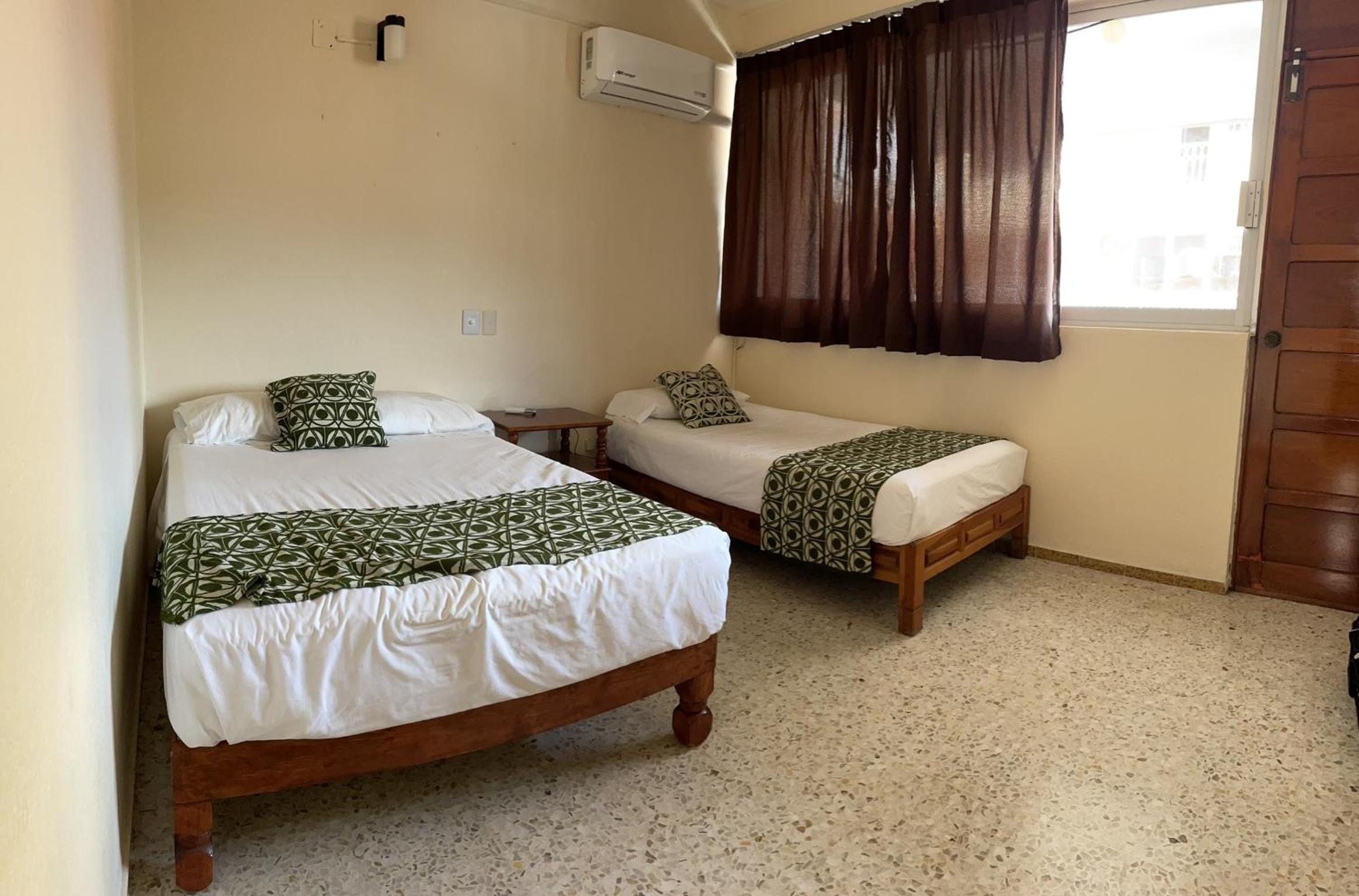 Family Suite with Balcony - Photo 1