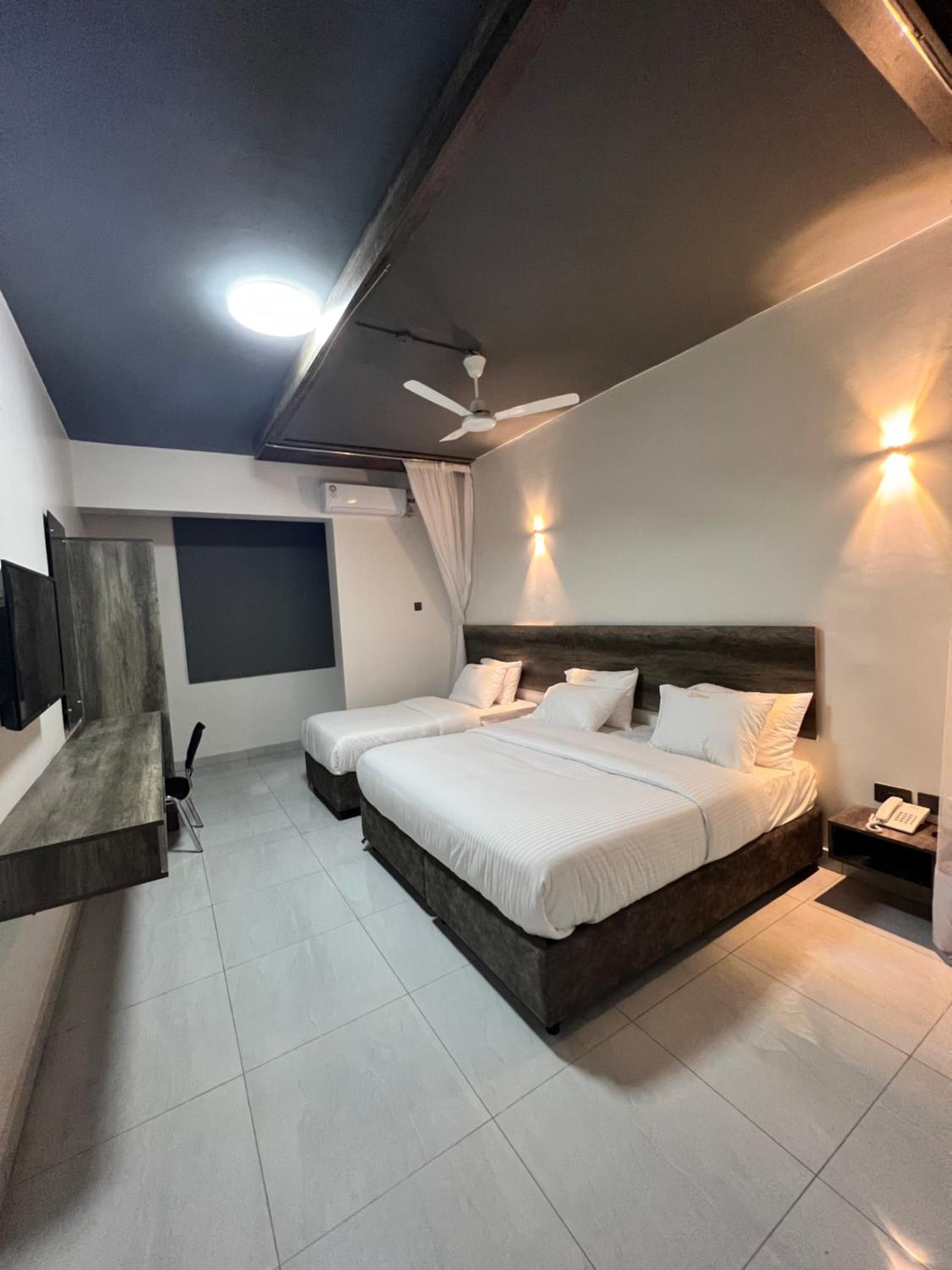 Deluxe Triple Room - Photo 1