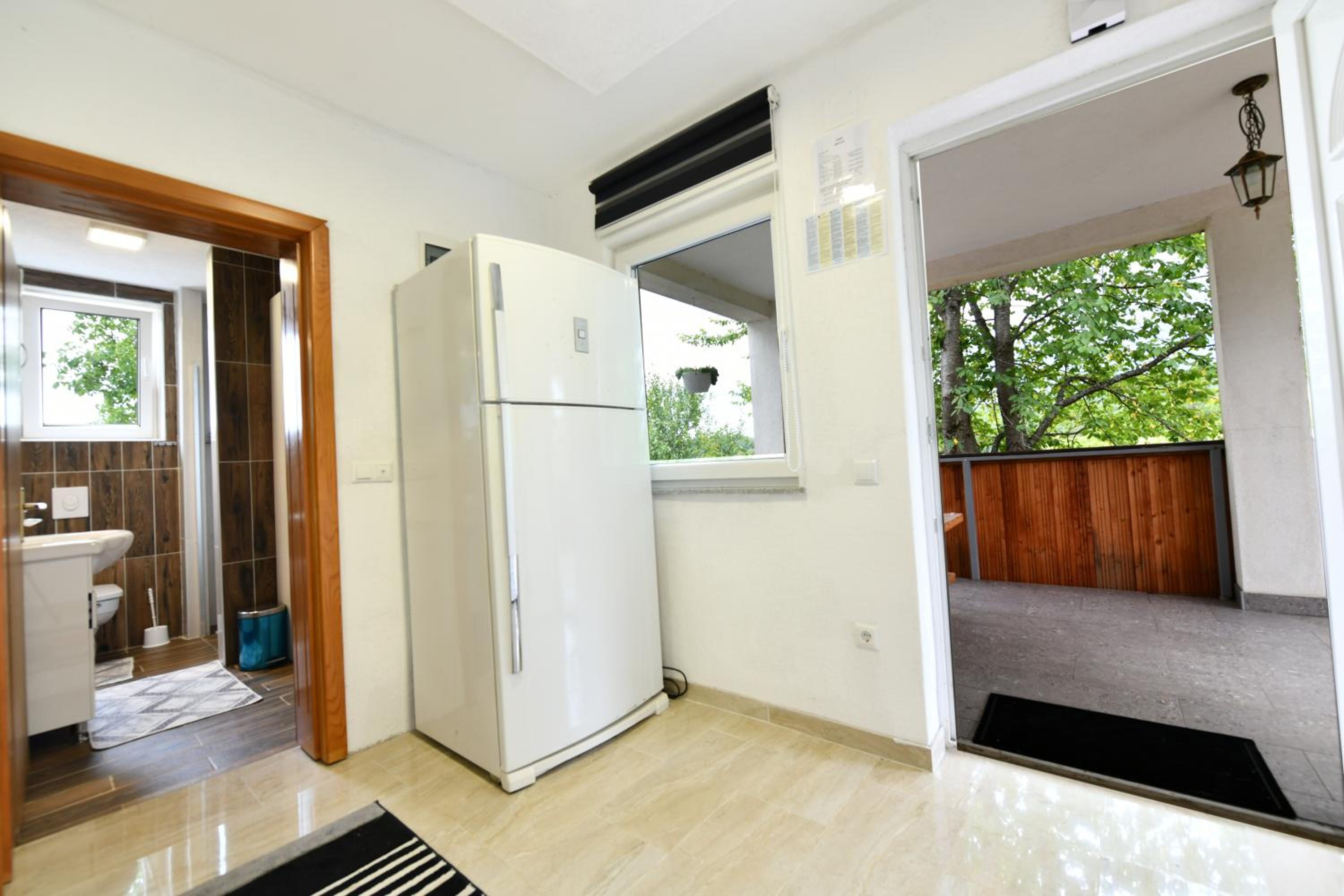 Three-Bedroom Apartment - Photo 33