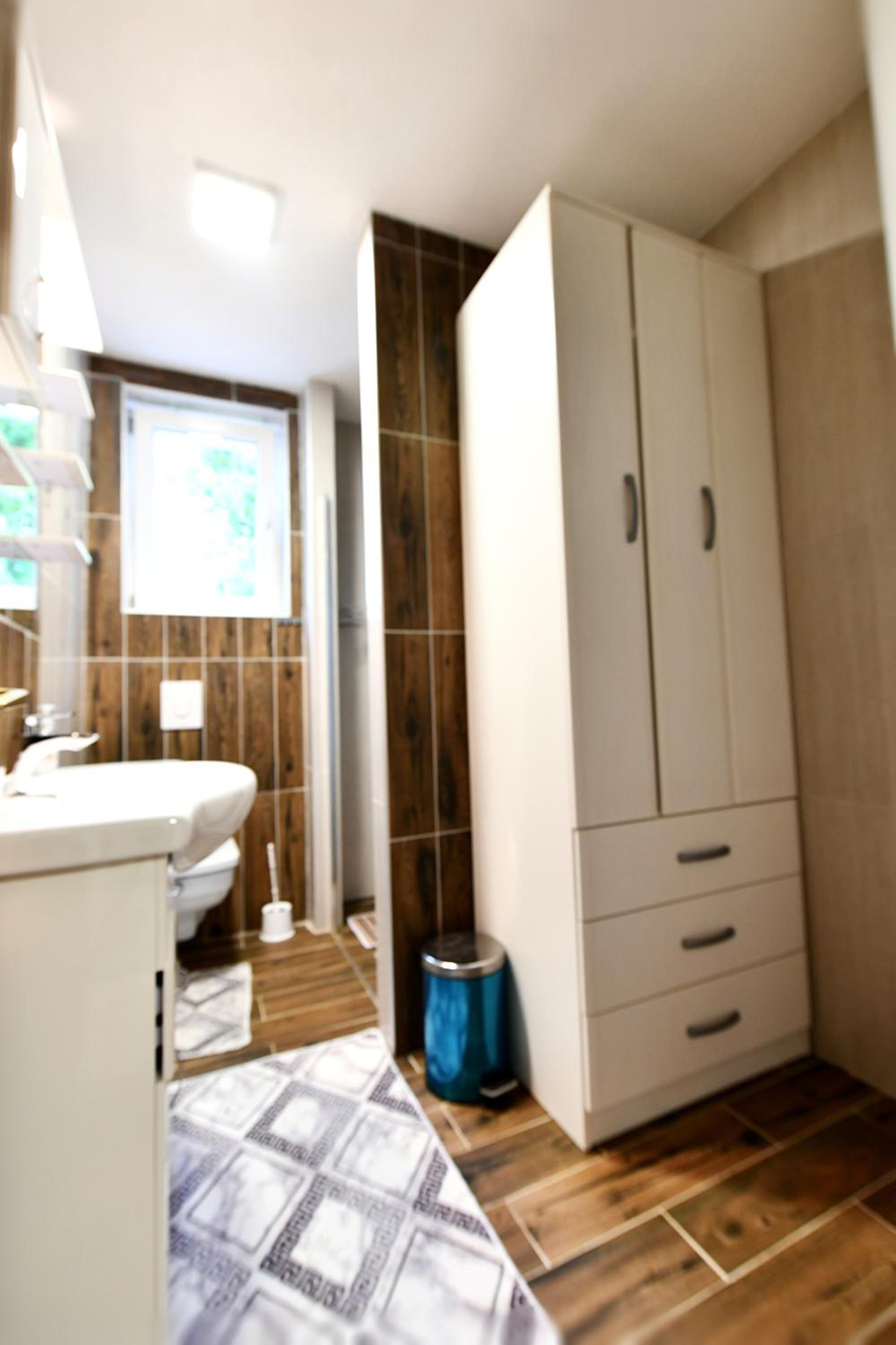 Three-Bedroom Apartment - Photo 34