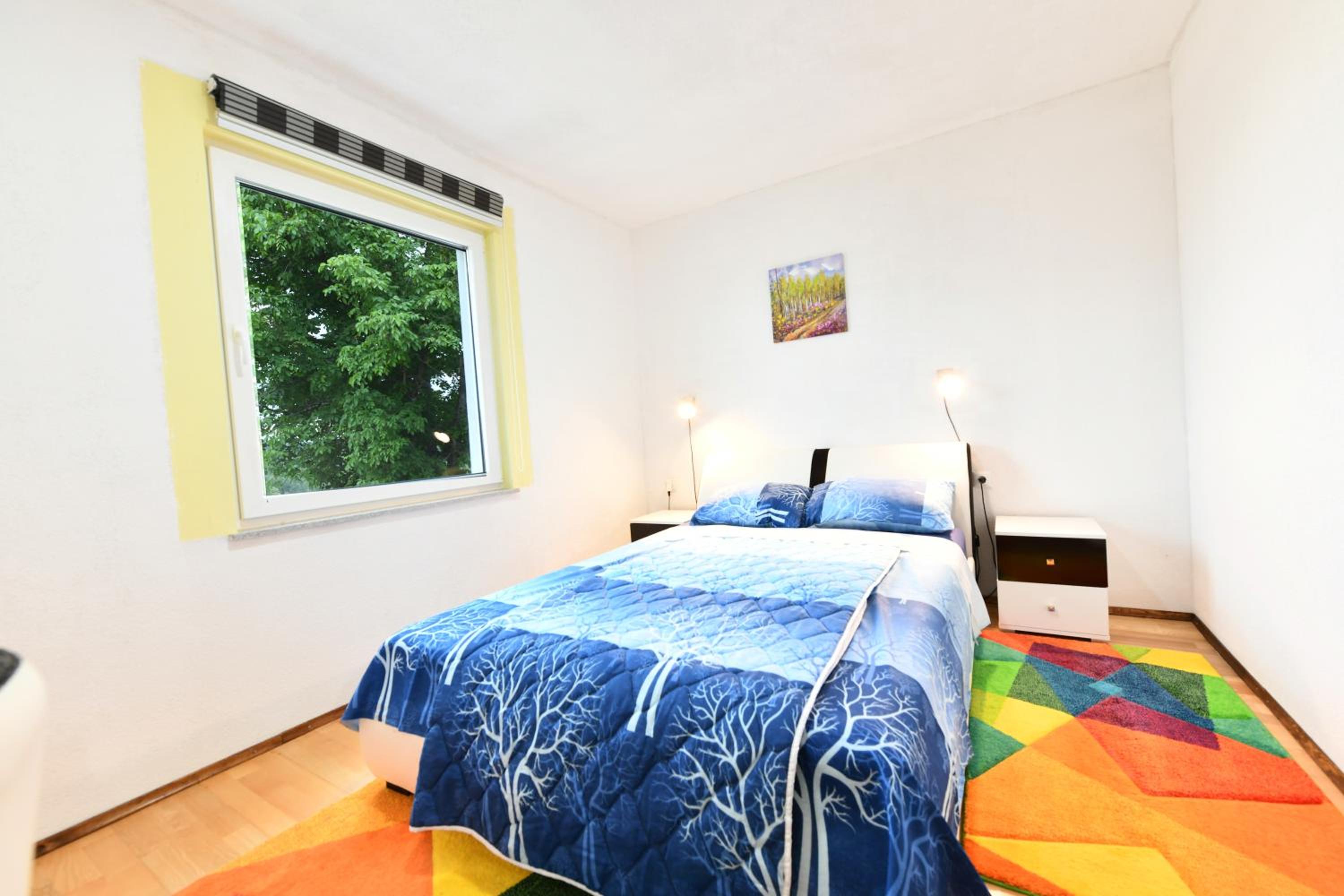 Three-Bedroom Apartment - Photo 36