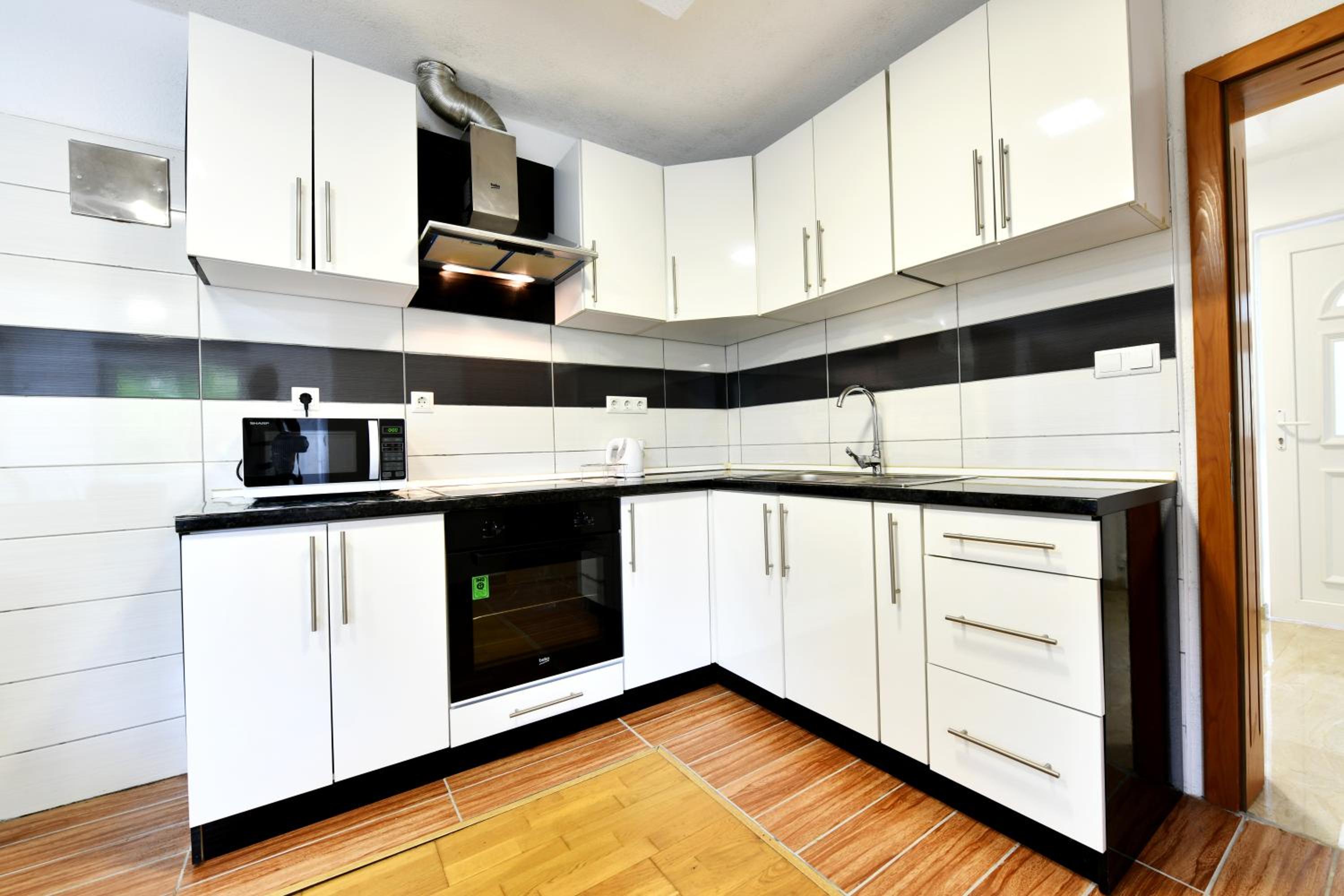 Three-Bedroom Apartment - Photo 39
