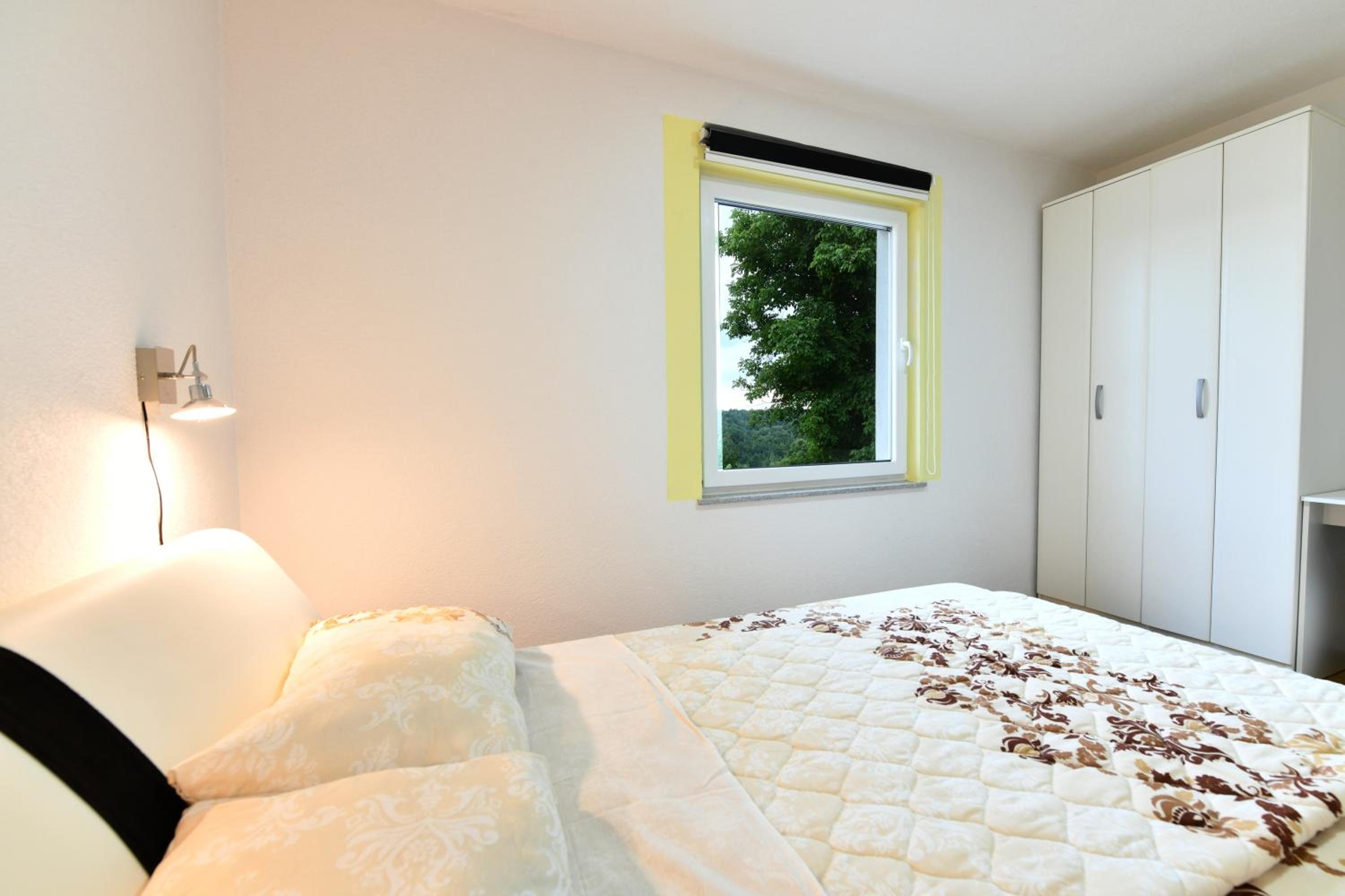 Three-Bedroom Apartment - Photo 2