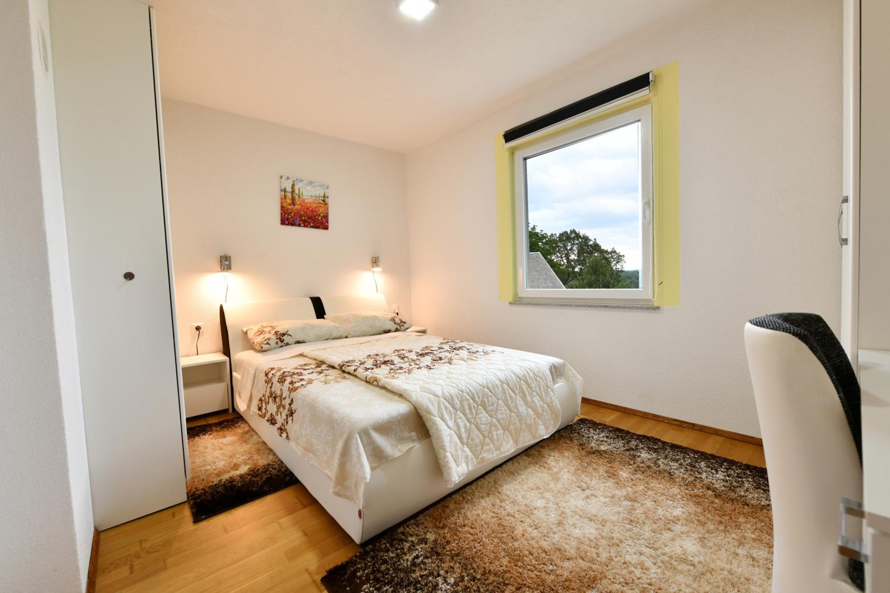 Three-Bedroom Apartment - Photo 6