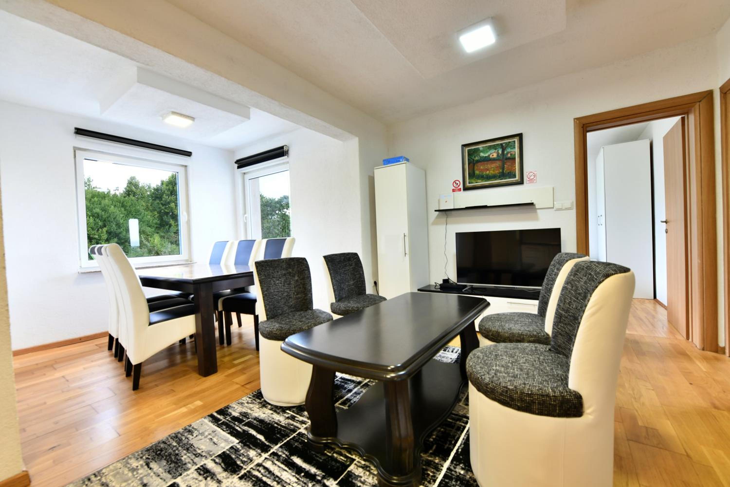 Three-Bedroom Apartment - Photo 8