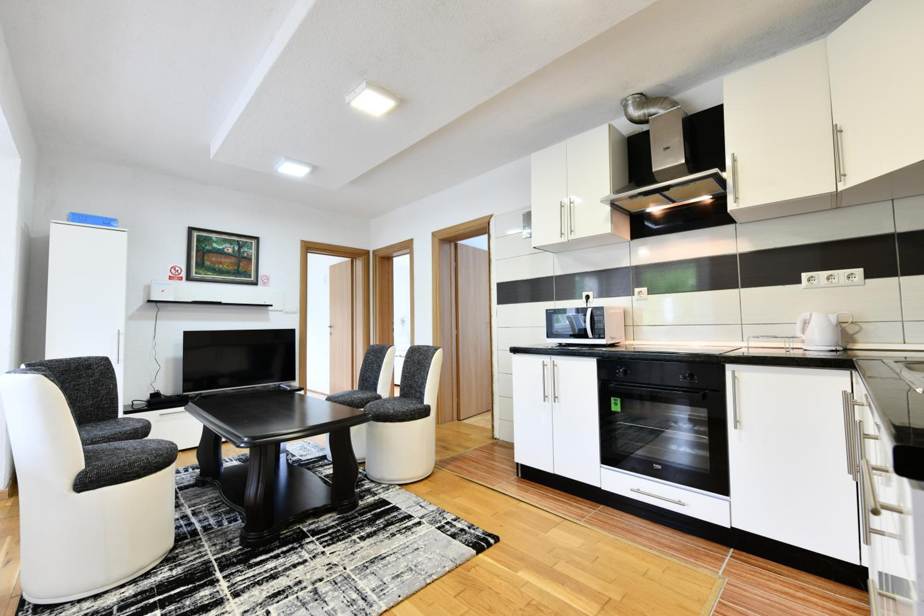 Three-Bedroom Apartment - Photo 10