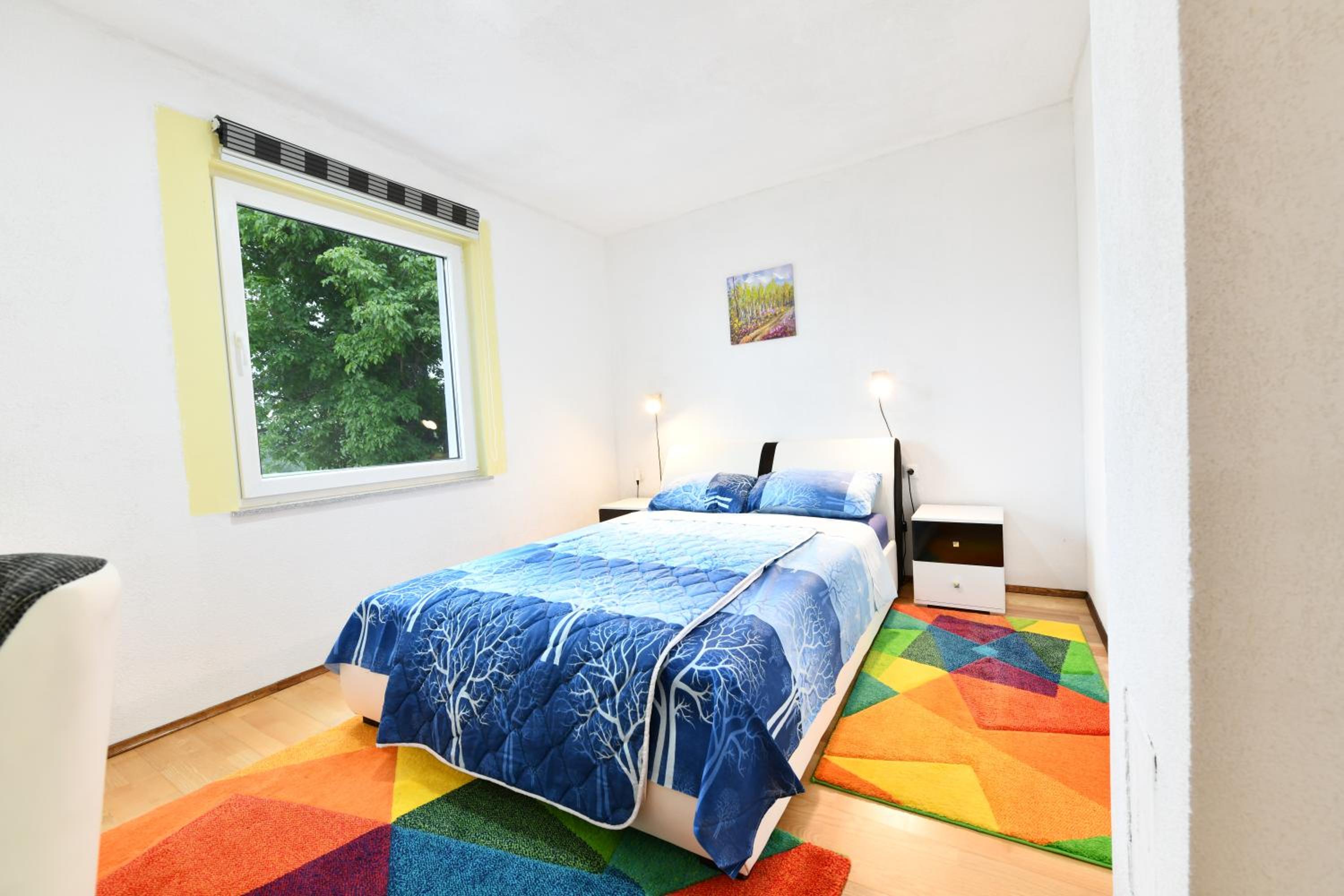 Three-Bedroom Apartment - Photo 11