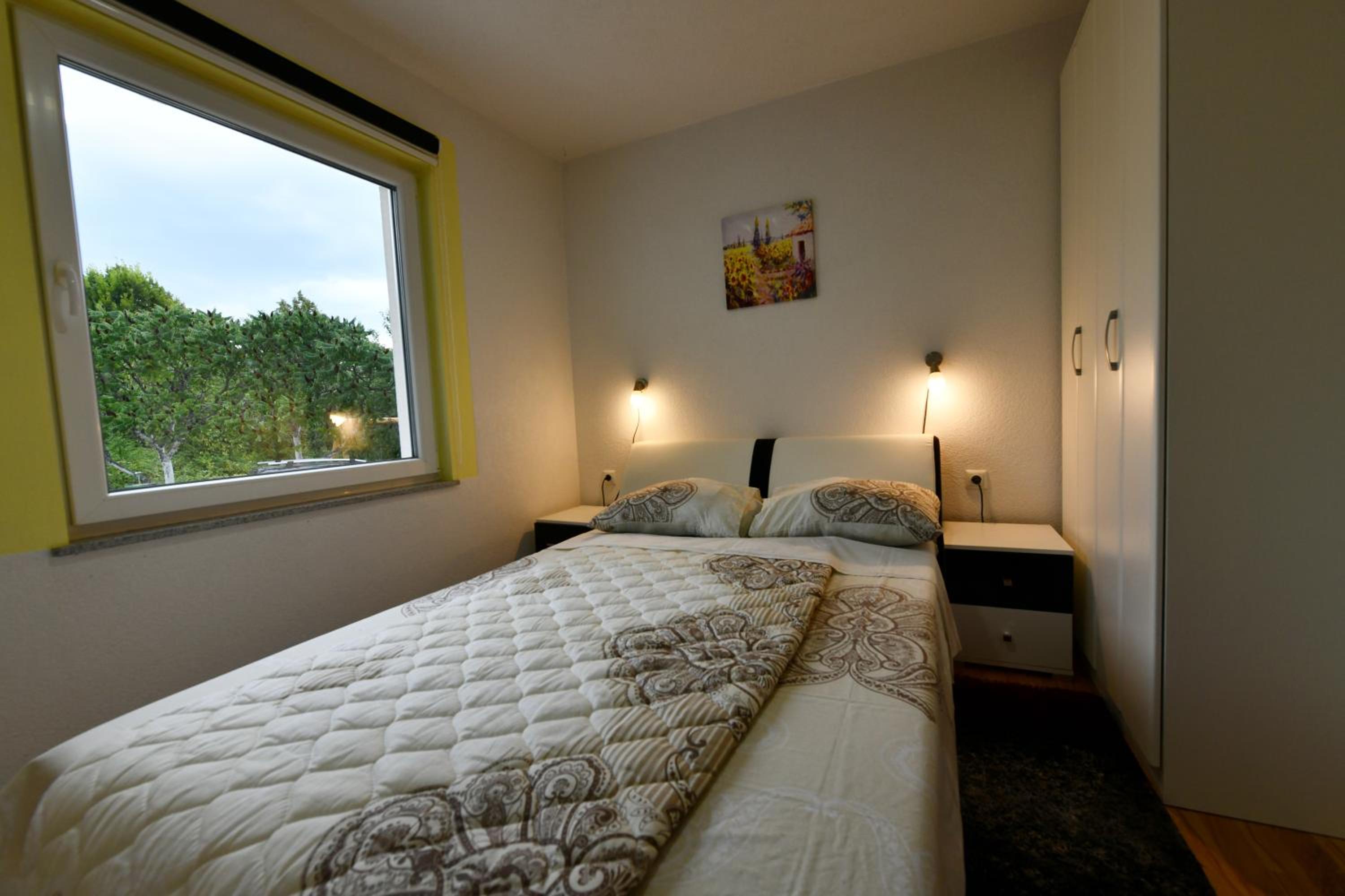 Three-Bedroom Apartment - Photo 15