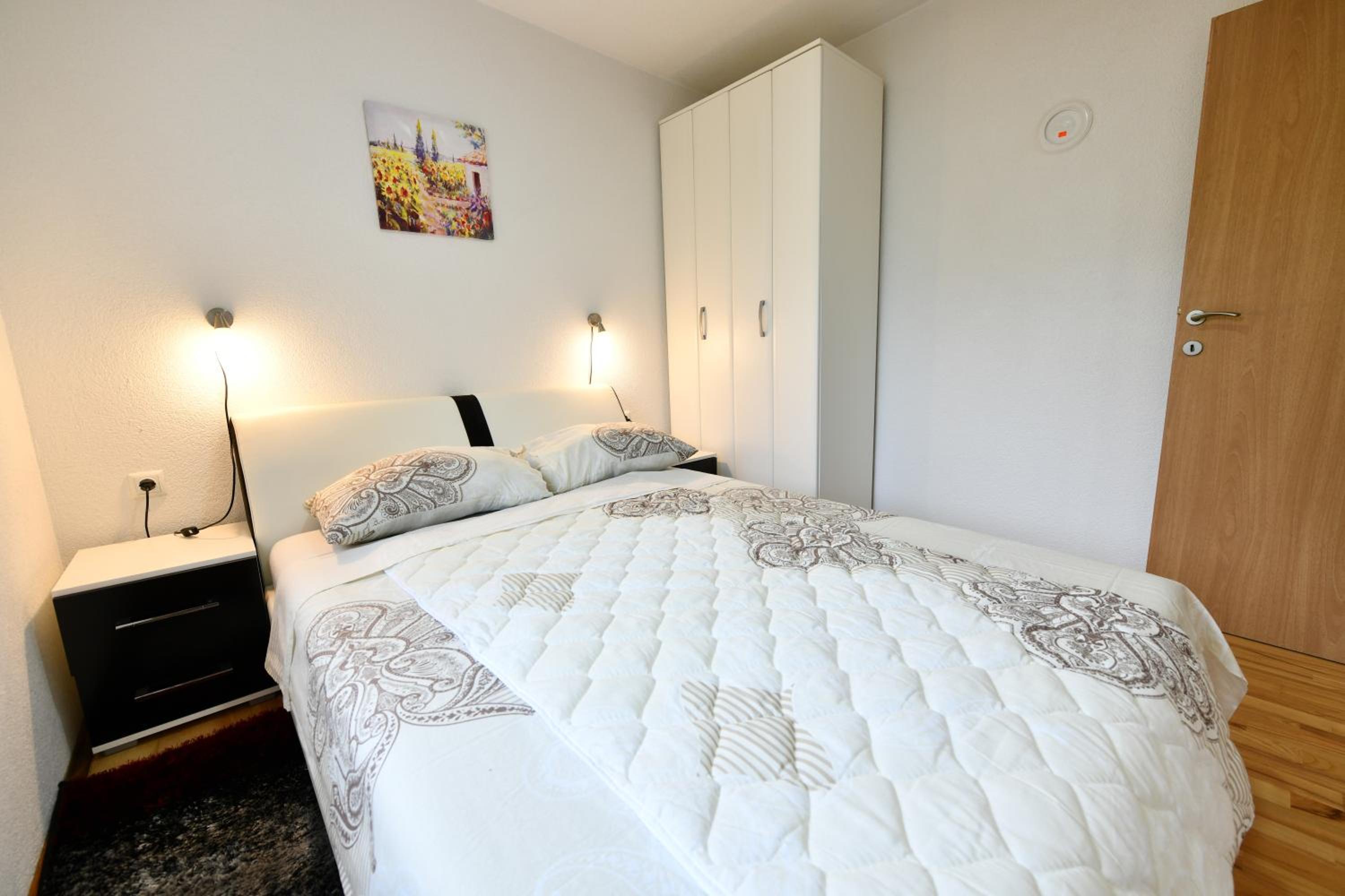 Three-Bedroom Apartment - Photo 24