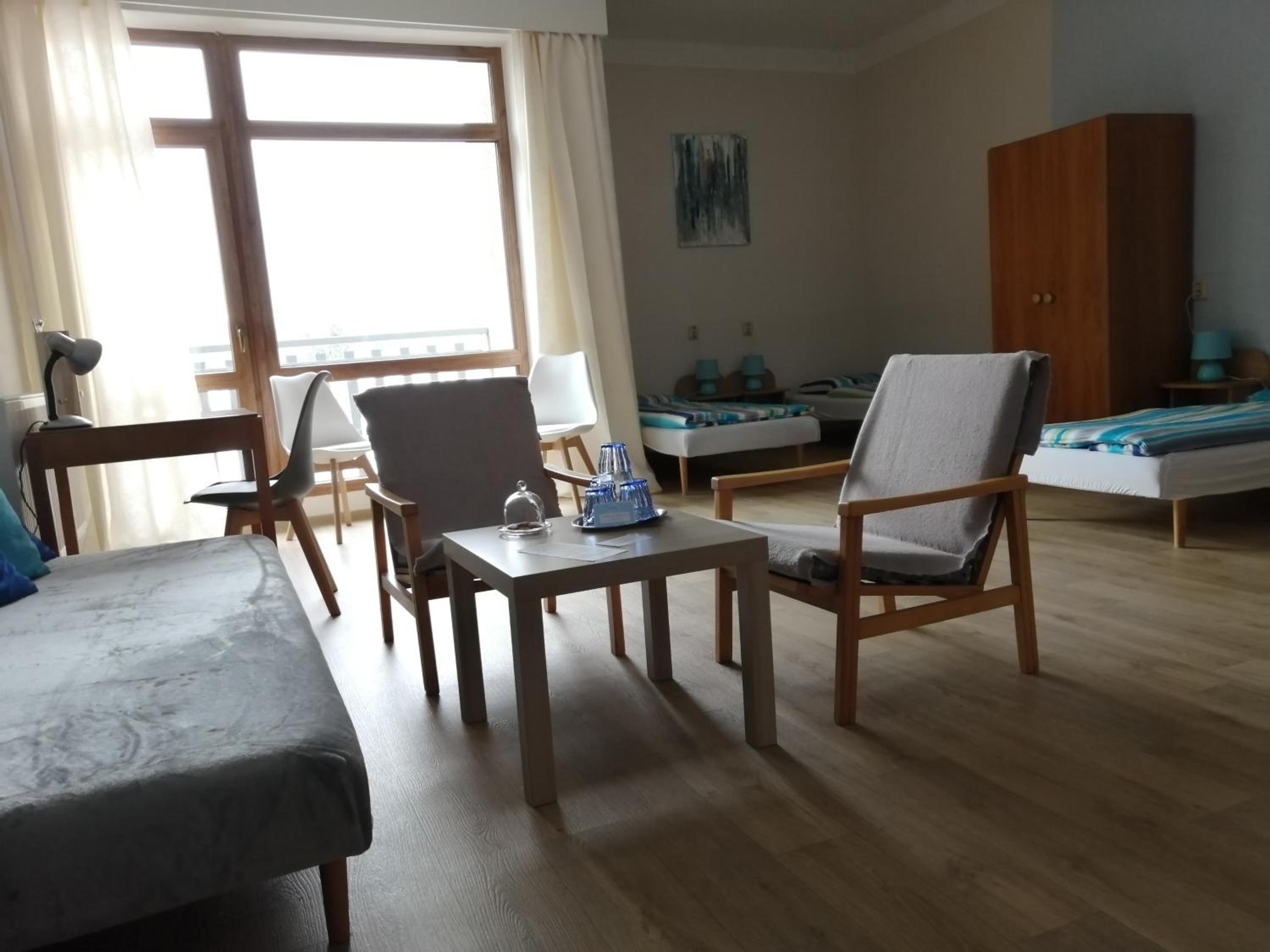 Family Room with Balcony - Photo 2