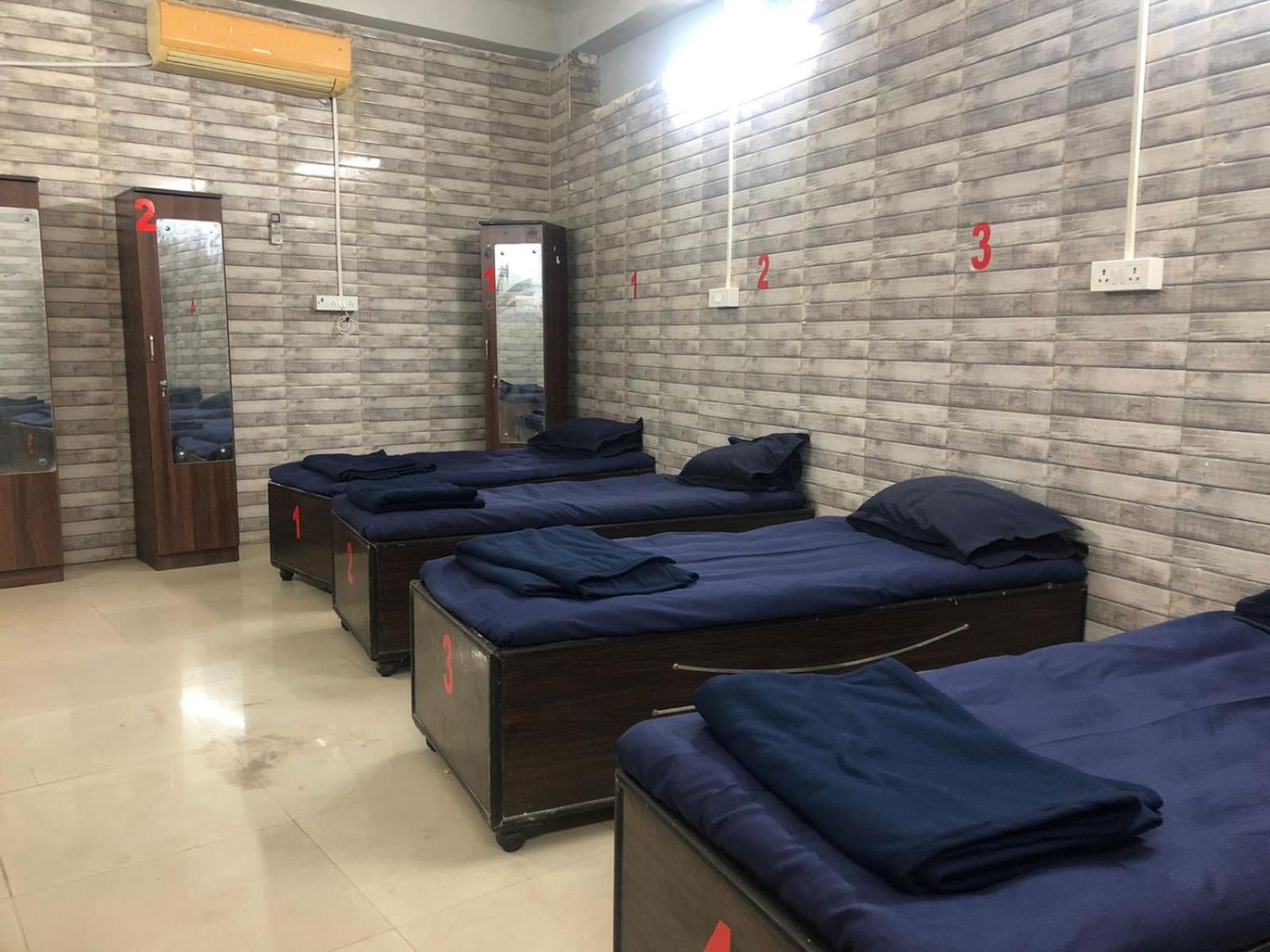 Single Bed In Male Dormitory Room With Shared Bathroom photo 1