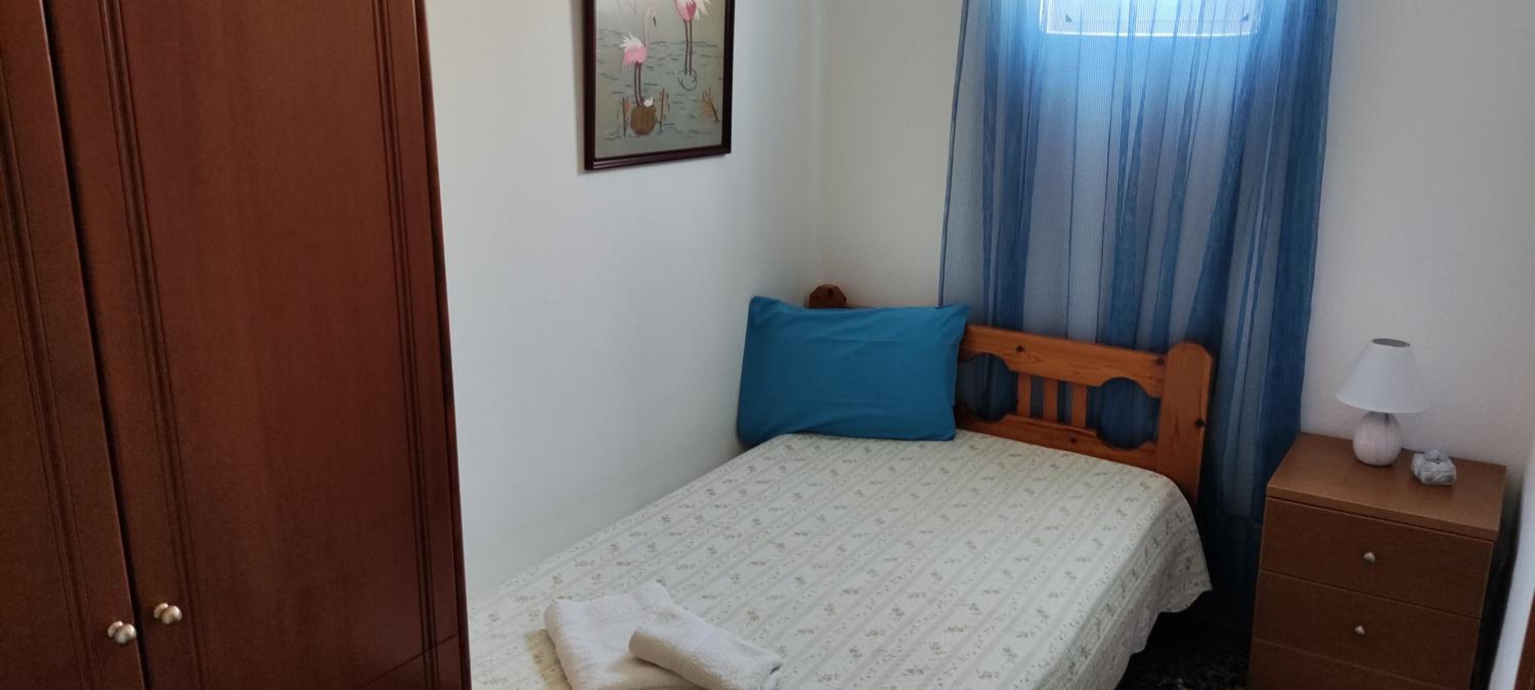Three-Bedroom House - Photo 22