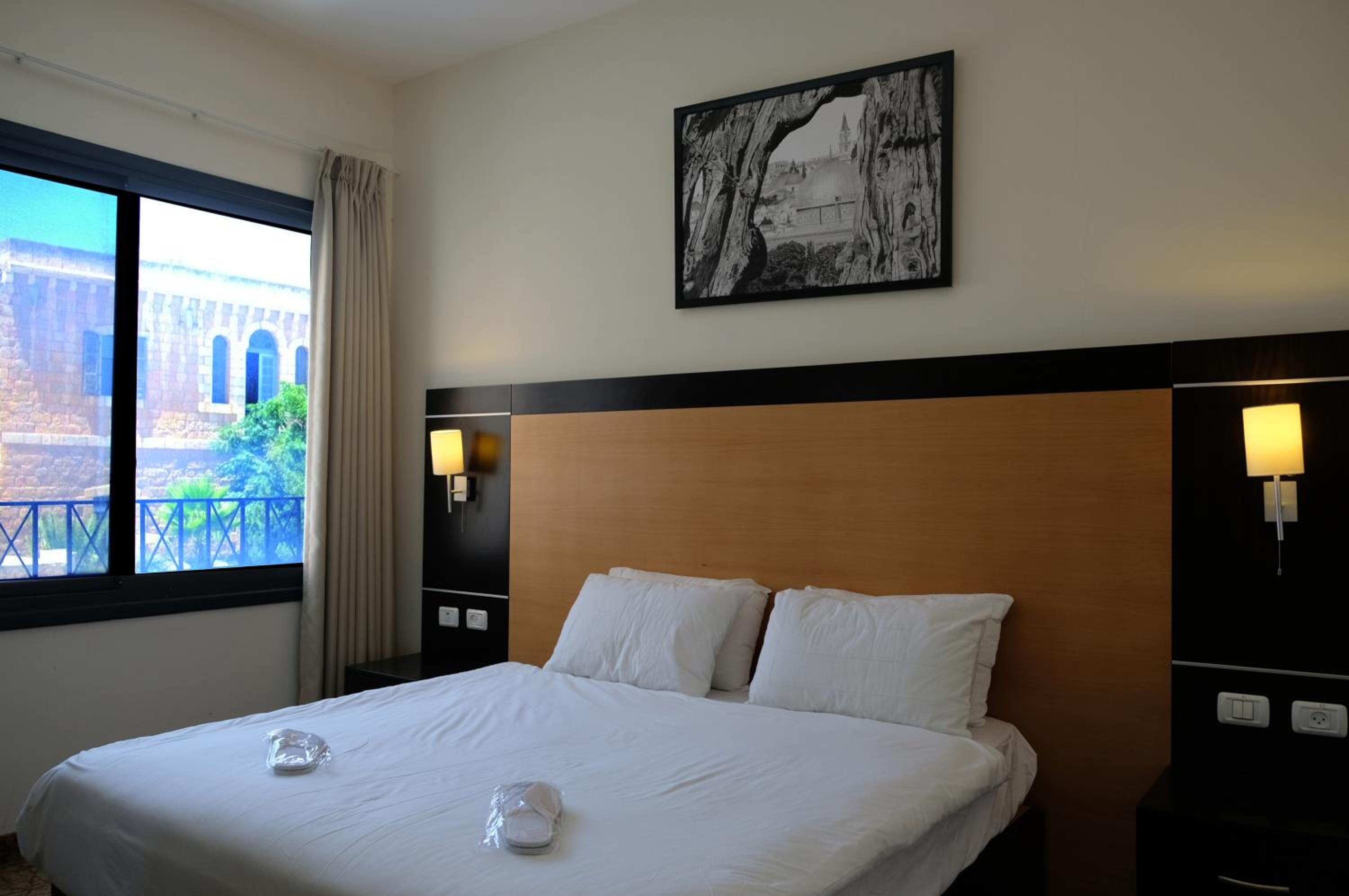 Standard Quadruple Room - Photo 19