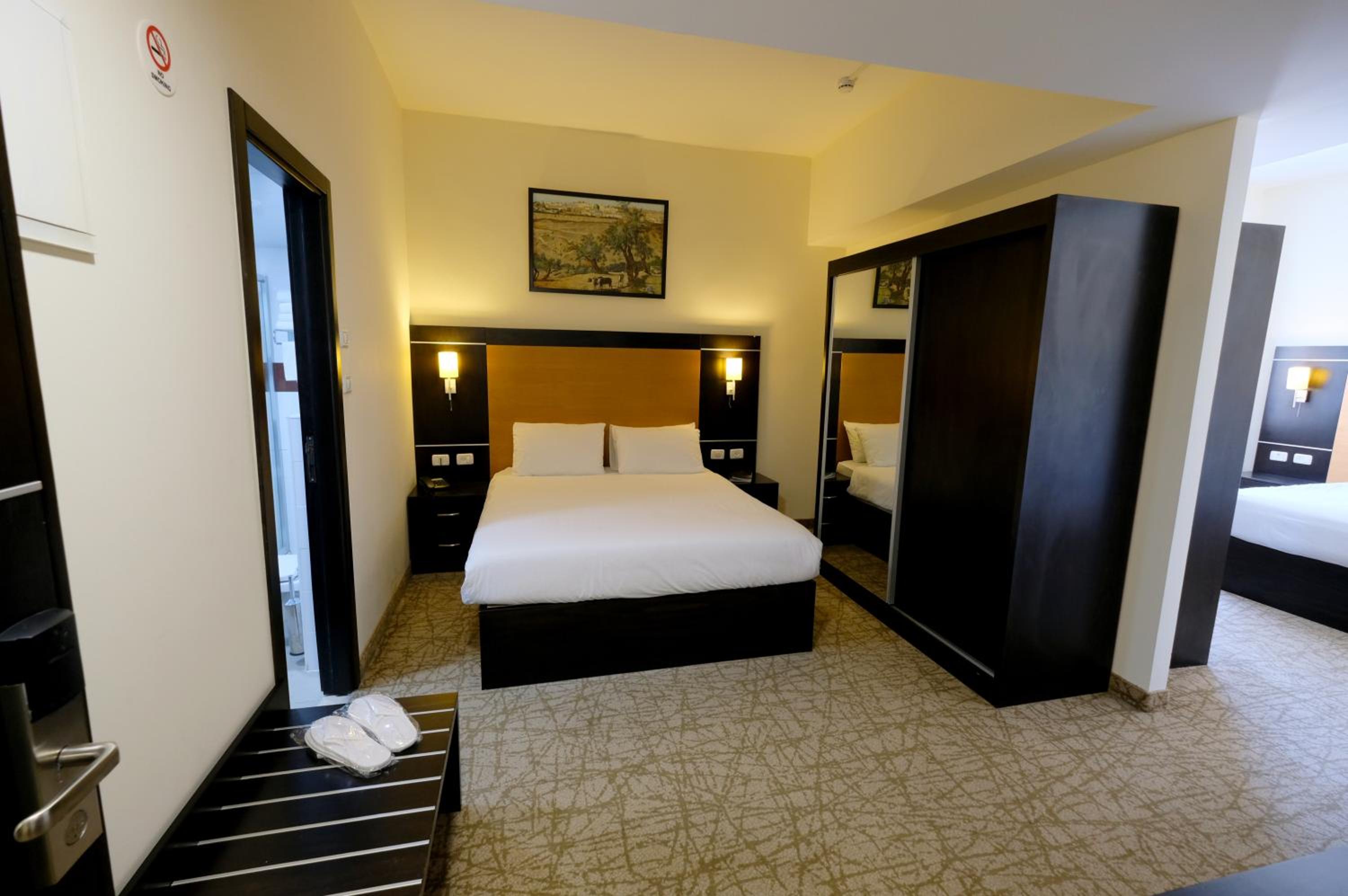 Standard Quadruple Room - Photo 21