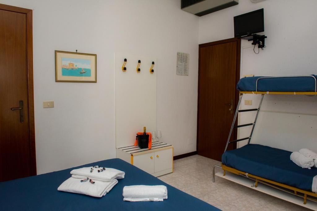 Quadruple Room - Beach included