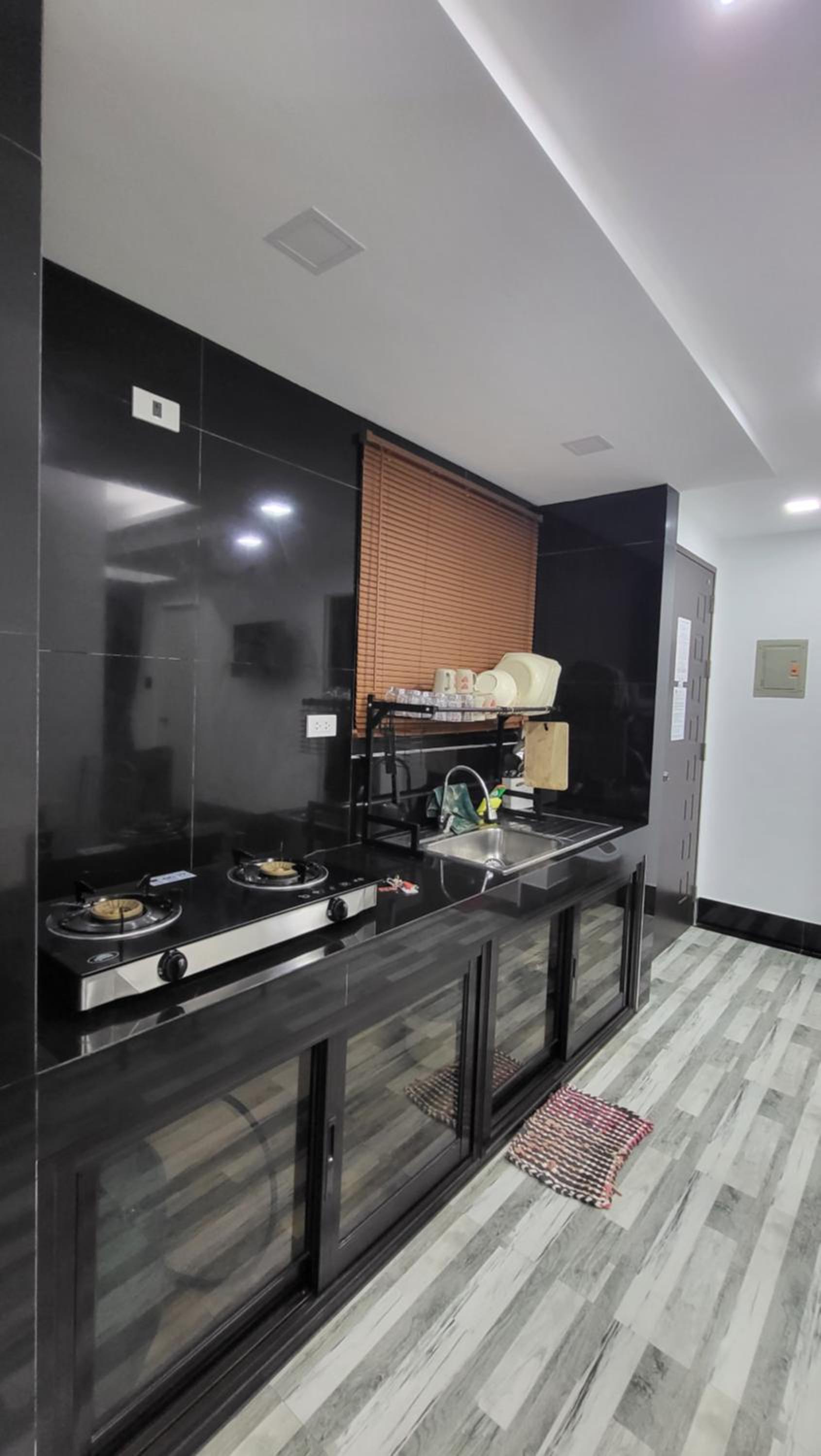 Three-Bedroom Apartment - Photo 12