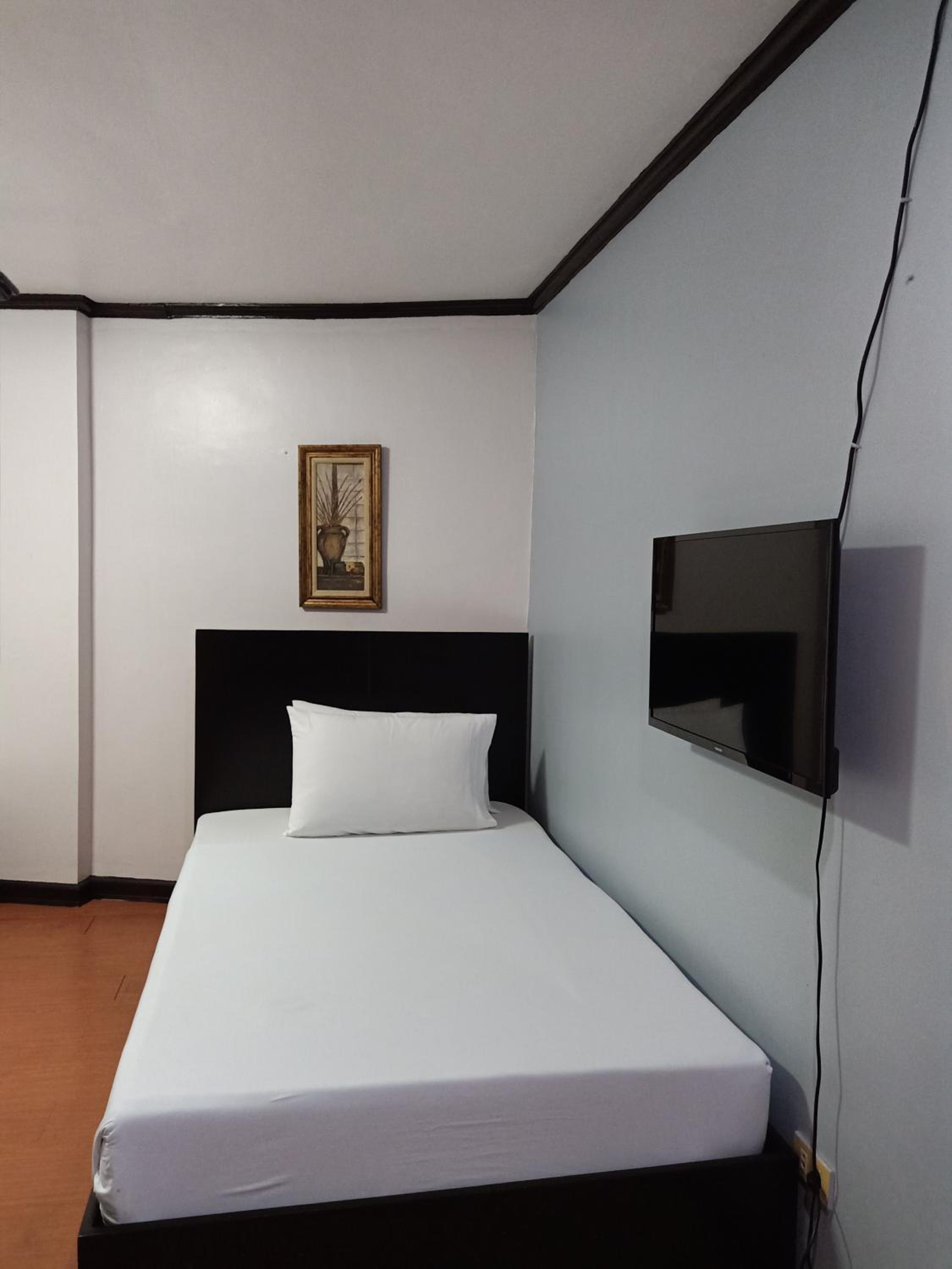 Deluxe Triple Room - Photo 8