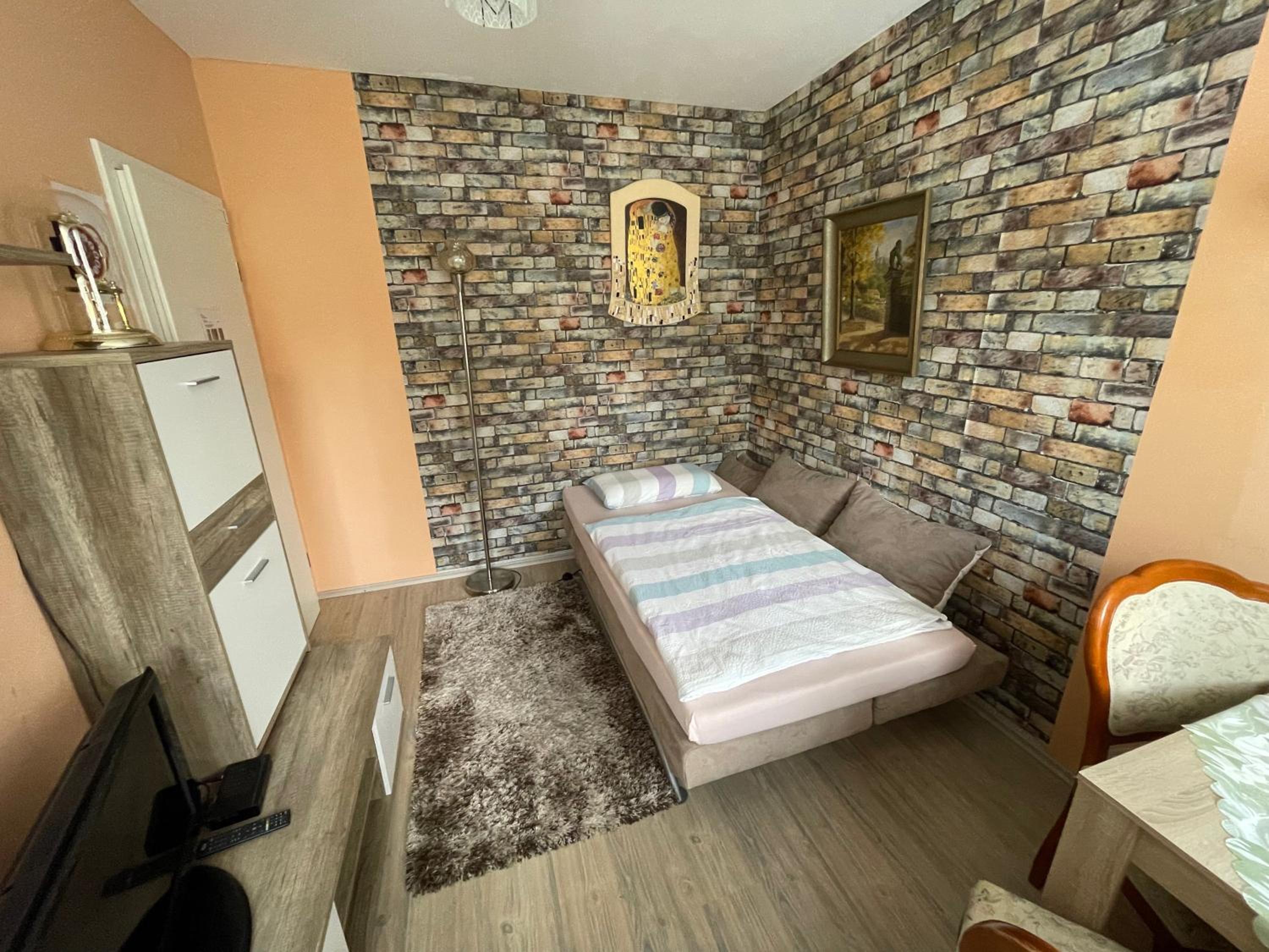 Three-Bedroom Apartment - Photo 11