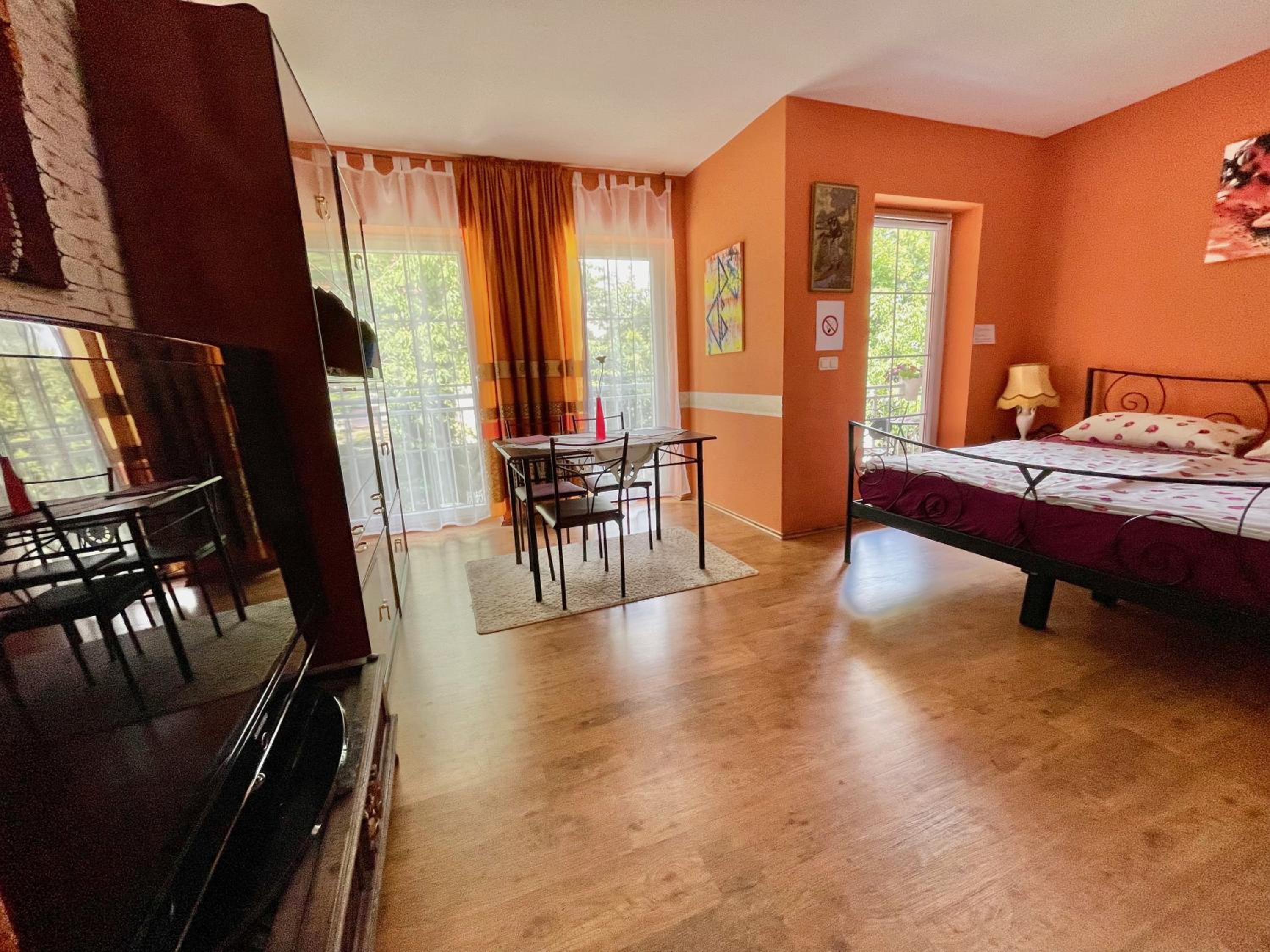 Three-Bedroom Apartment - Photo 12