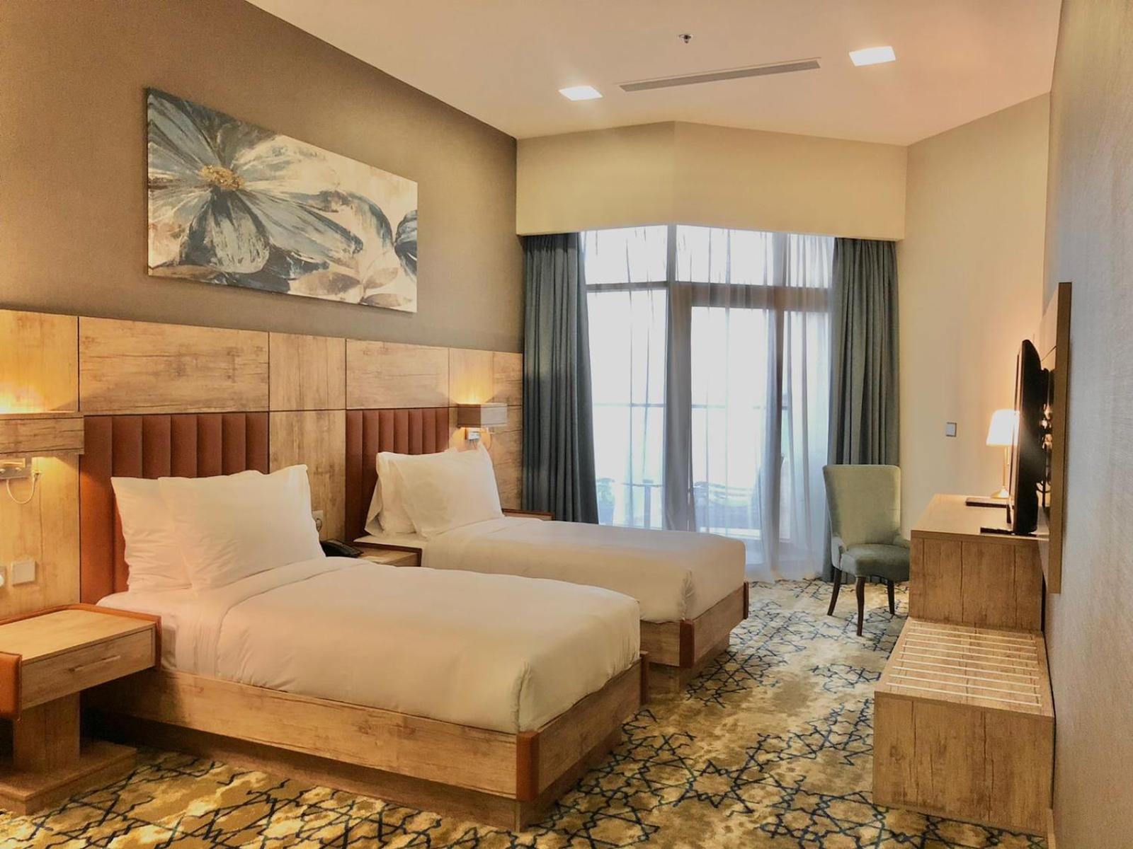 Deluxe Double Room with Side Sea View