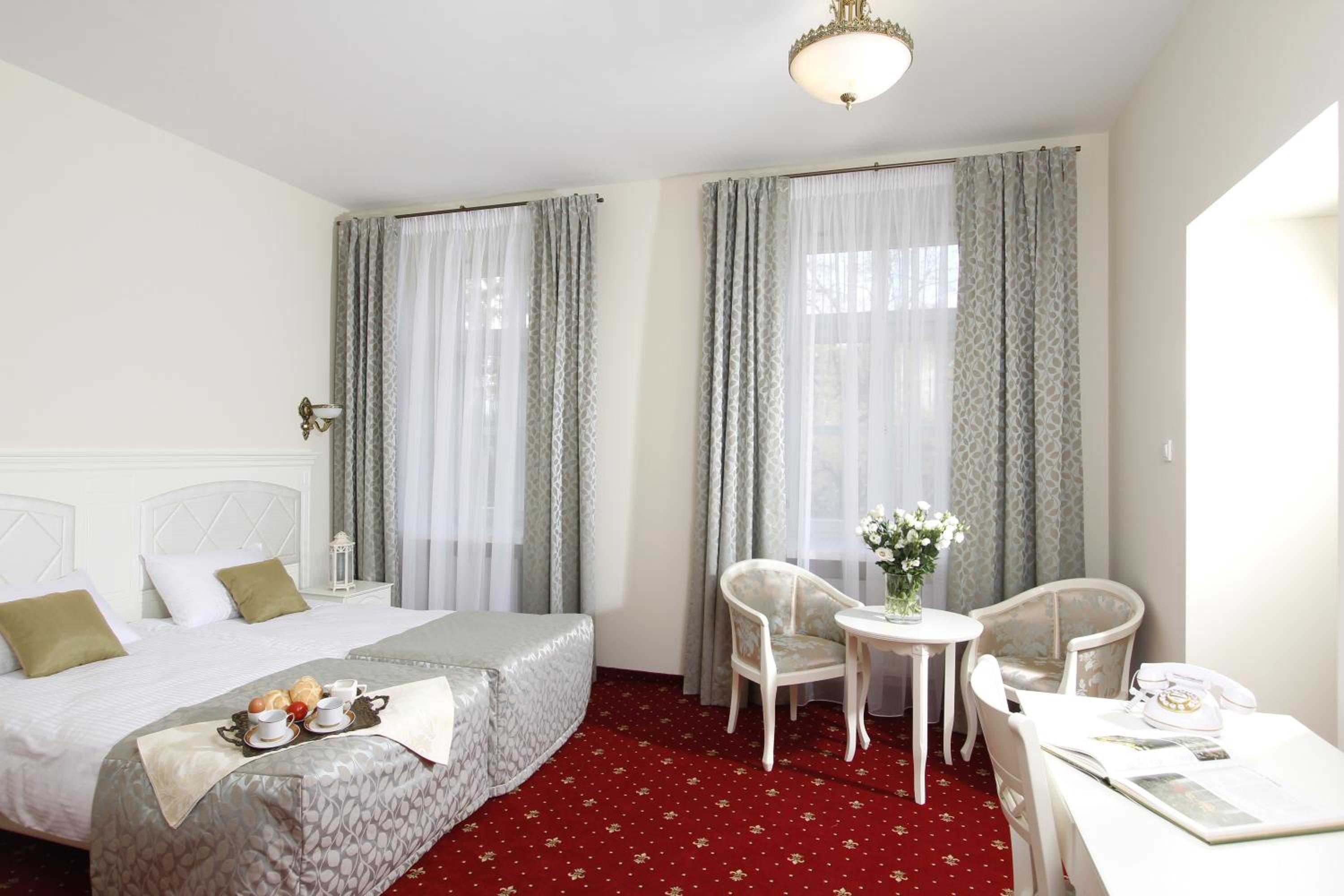 Deluxe Double Room with Balcony - Photo 1