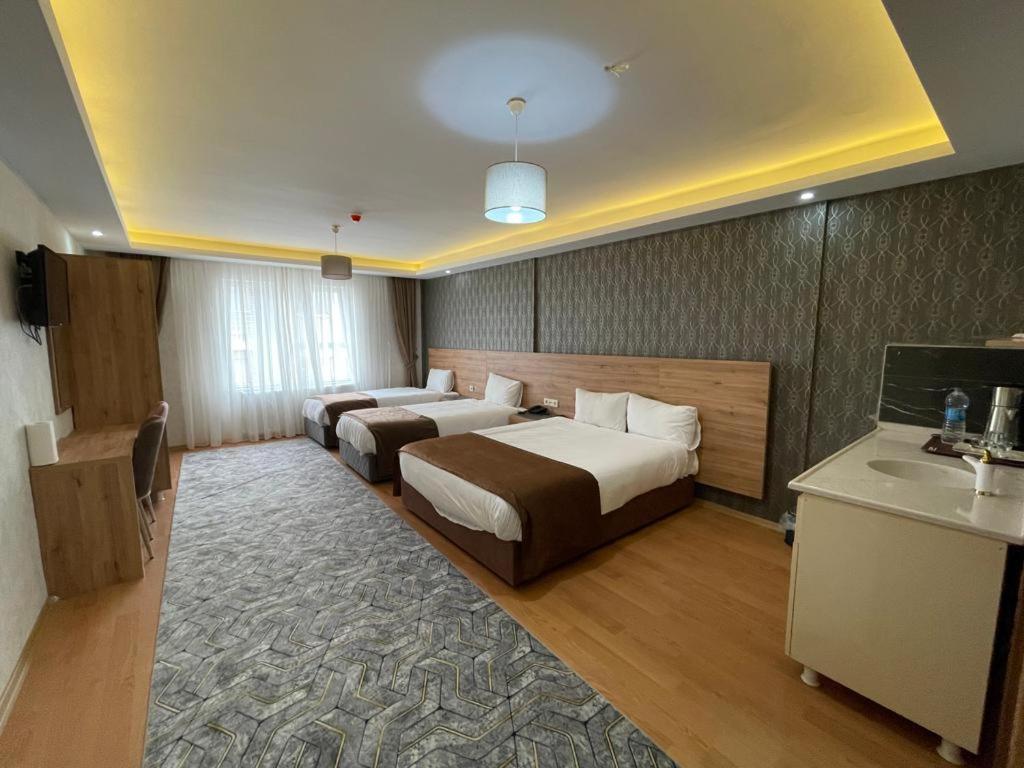 Deluxe Quadruple Room - Photo 1