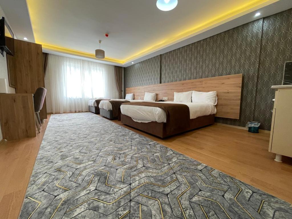 Deluxe Quadruple Room - Photo 6