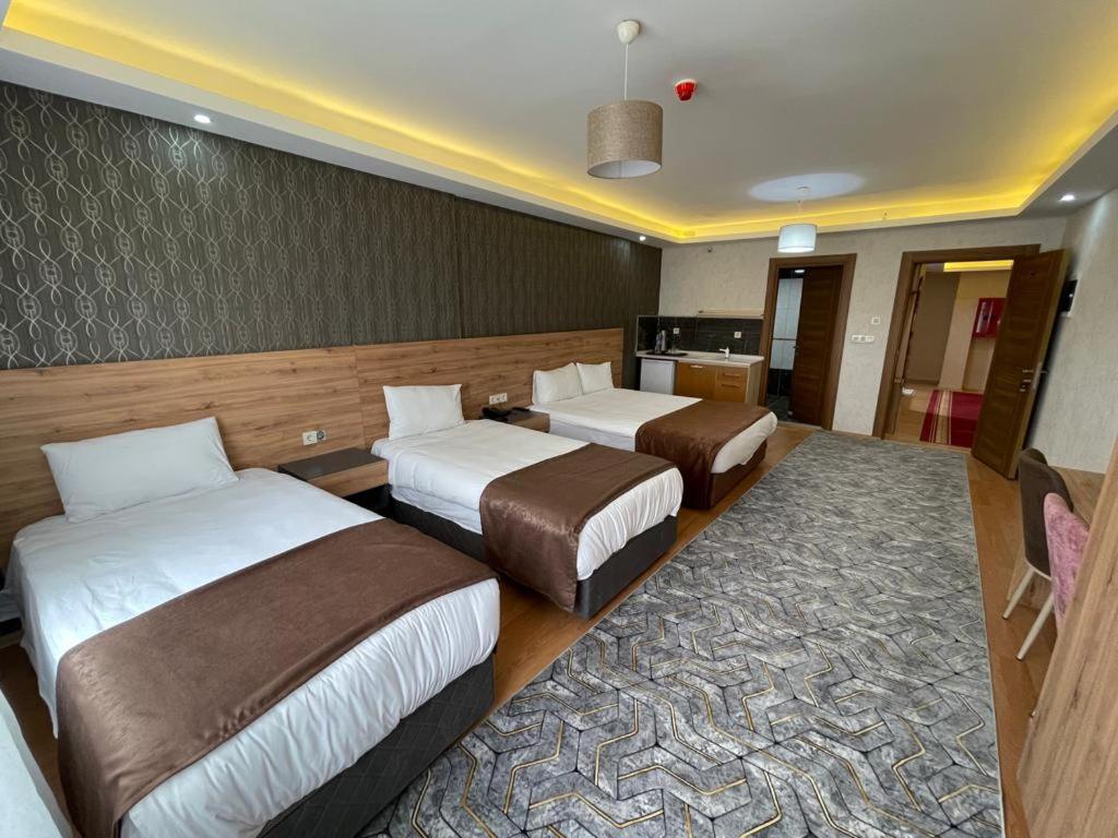Deluxe Quadruple Room - Photo 4