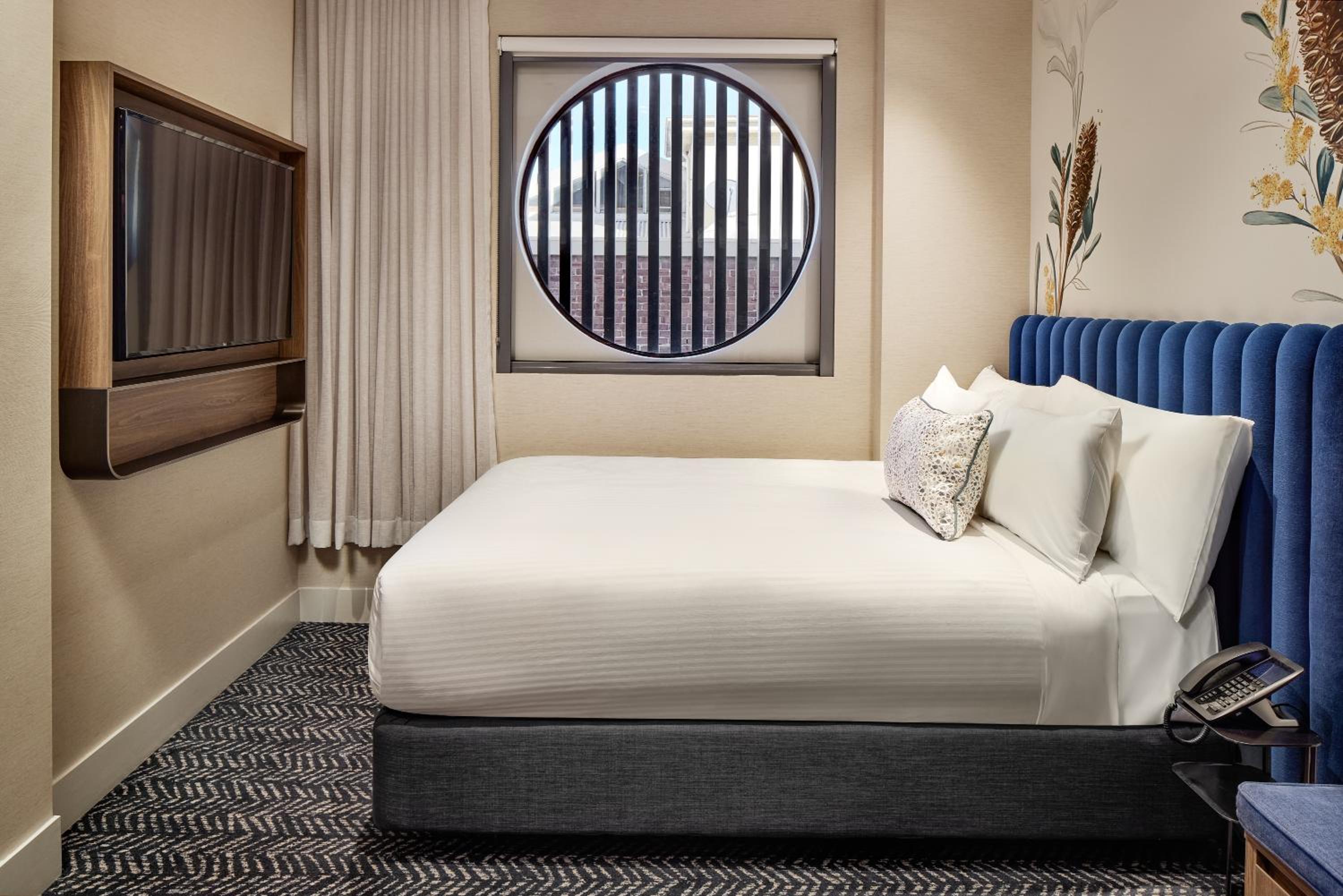 Queen Room with Mobility Accessible Roll-In Shower