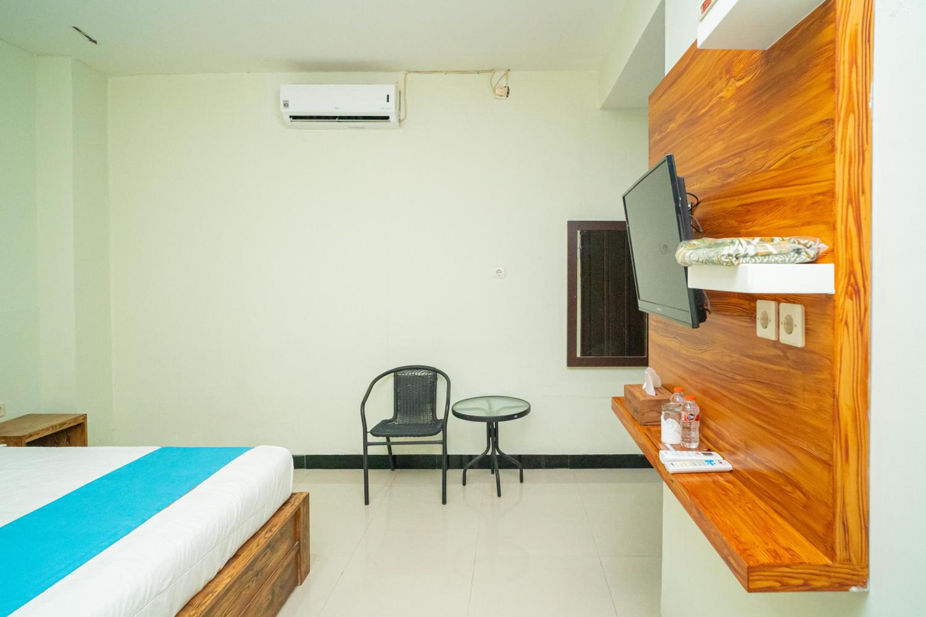 Deluxe Room - Photo 11