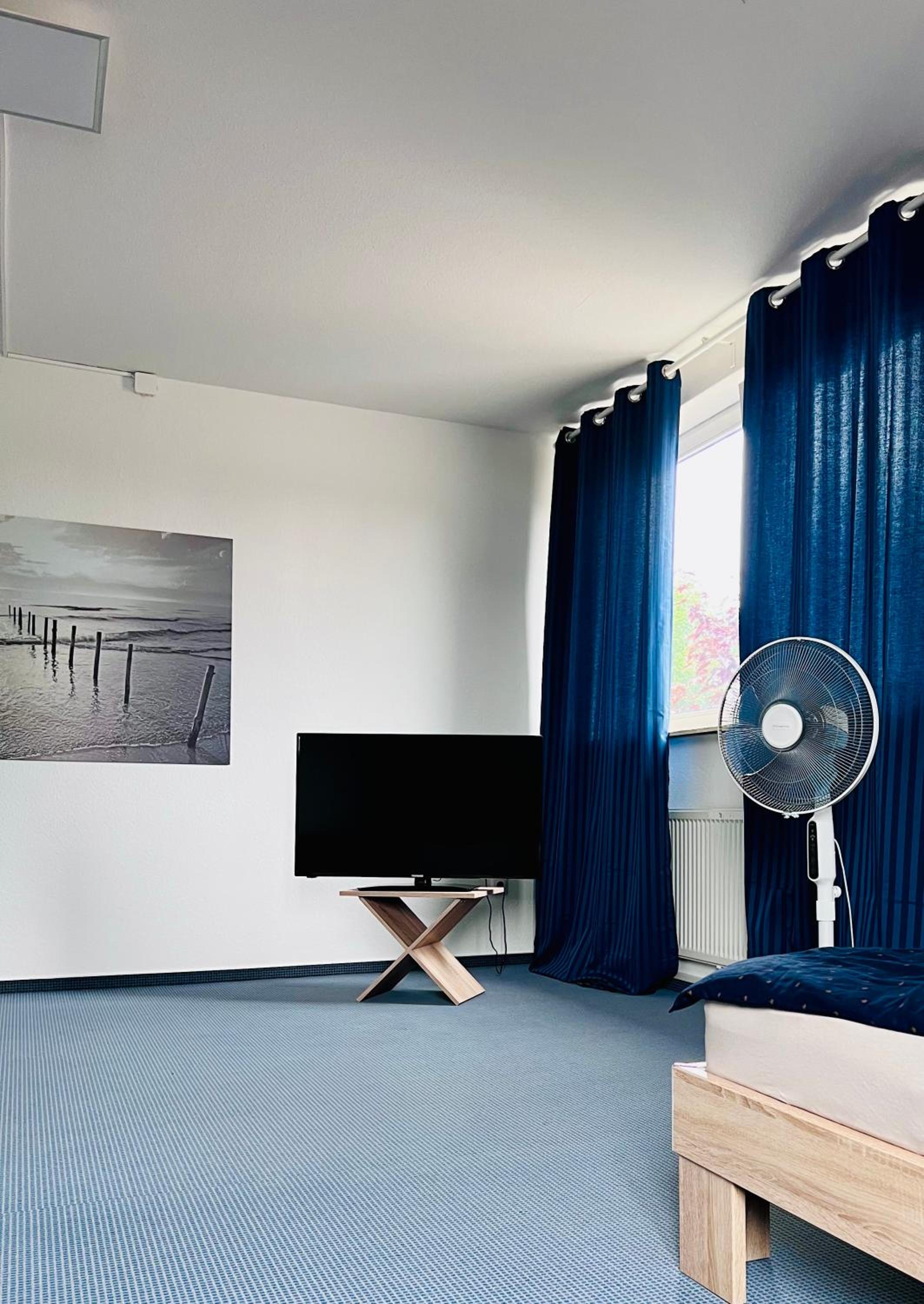 Three-Bedroom Apartment photo 1