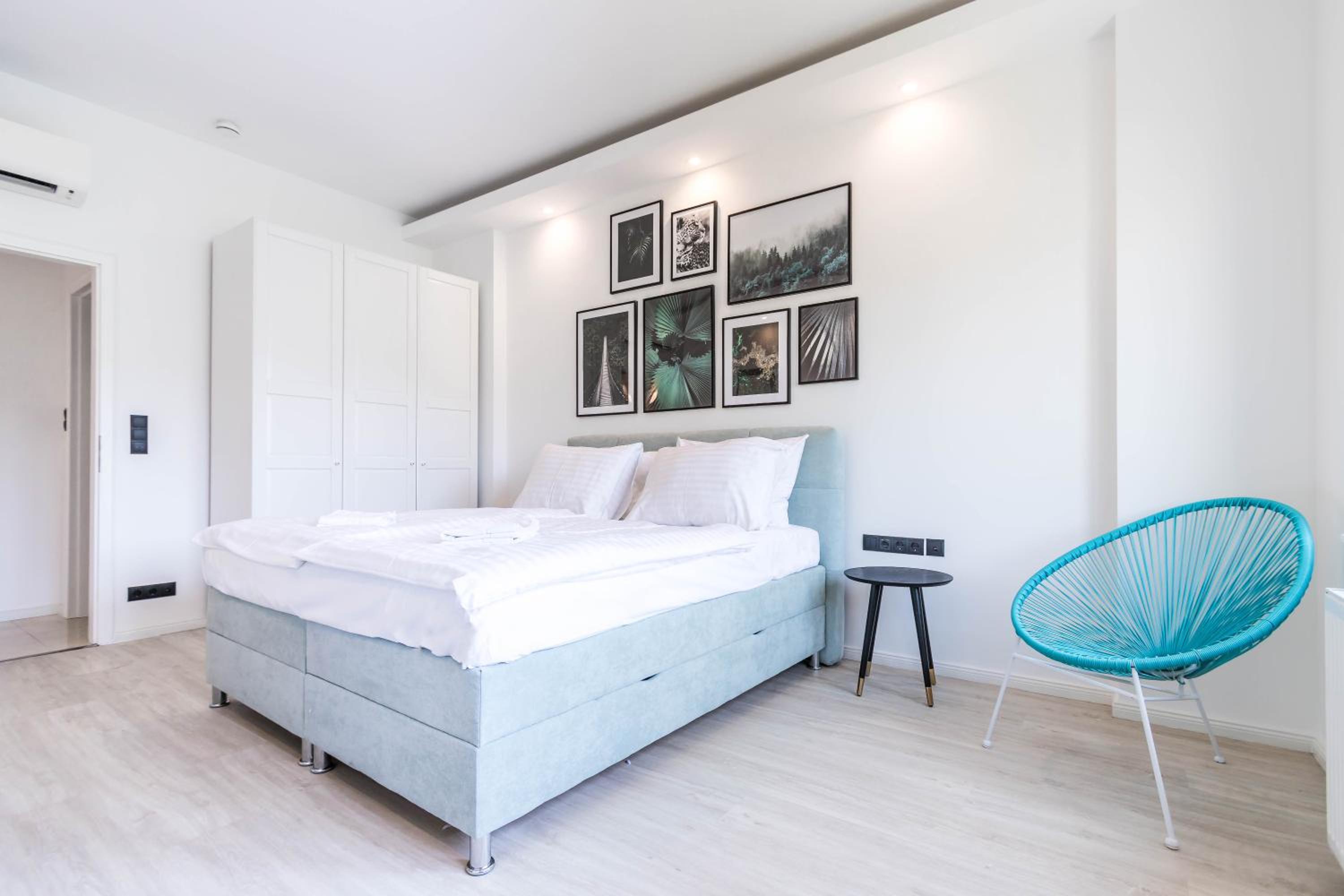 Three-Bedroom Apartment - Photo 12