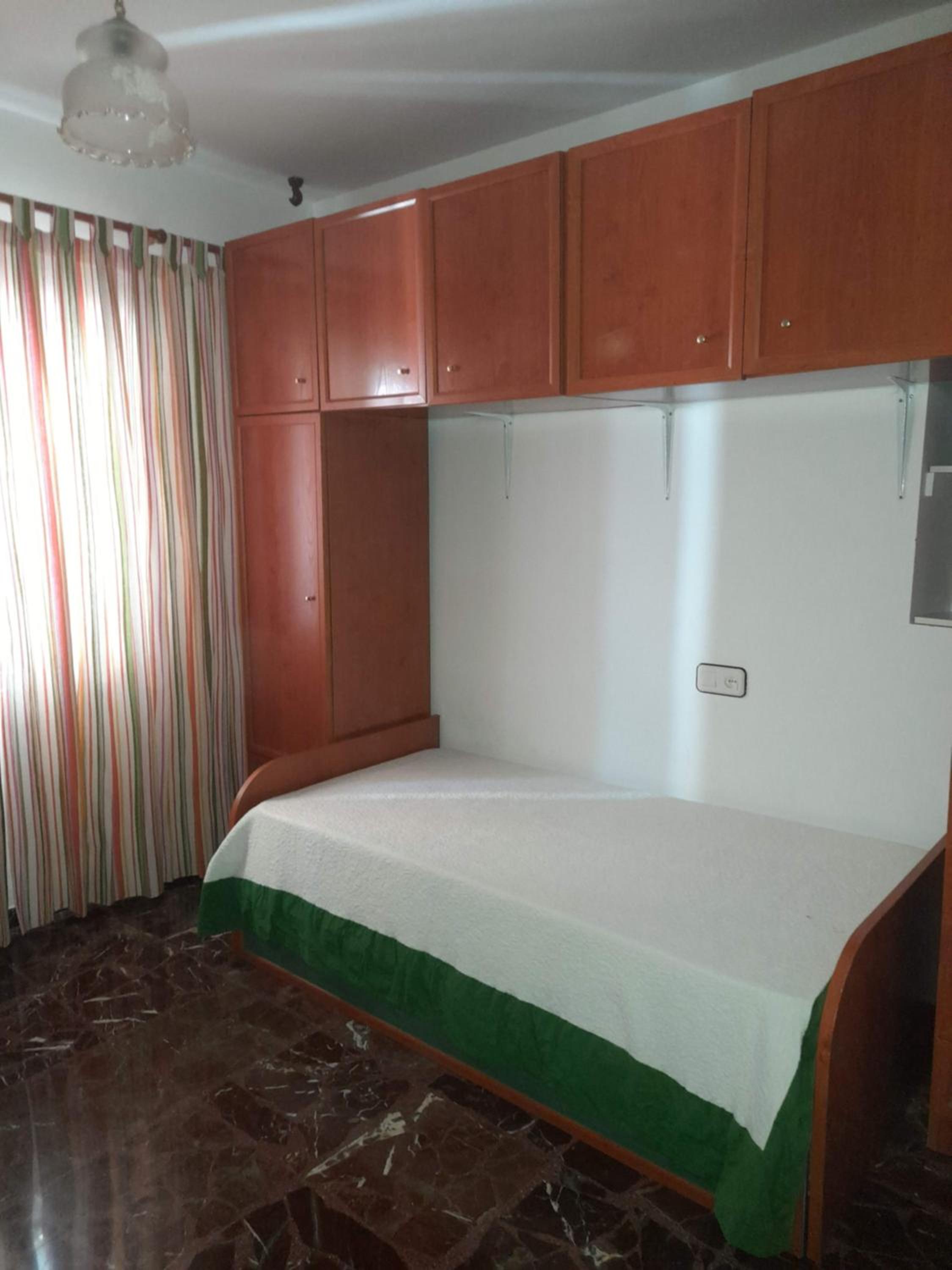 Three-Bedroom Apartment photo 2