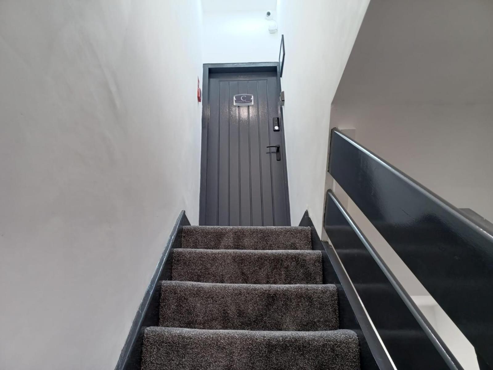 Three-Bedroom Apartment - Photo 10