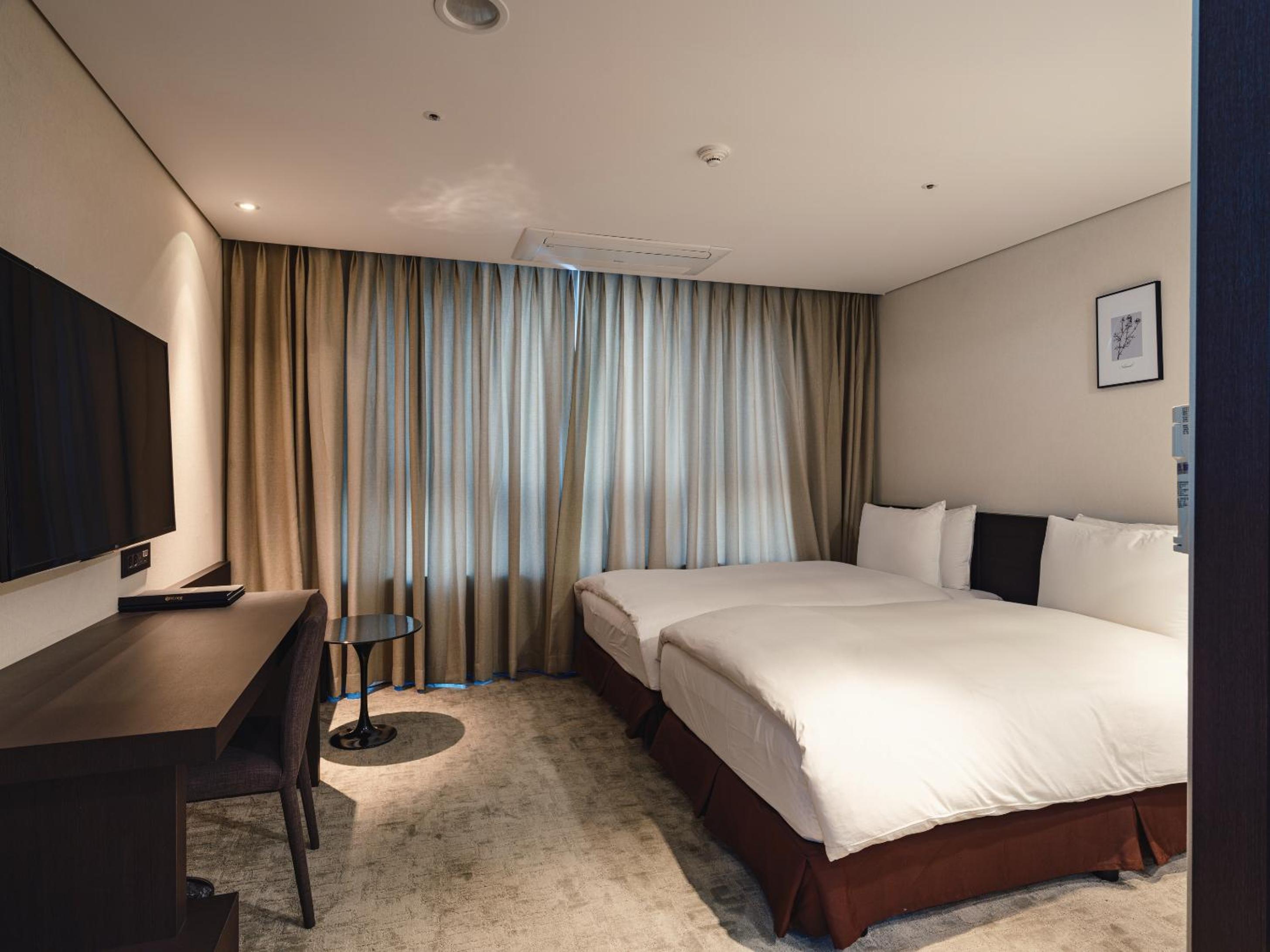 Twin Room - Photo 1